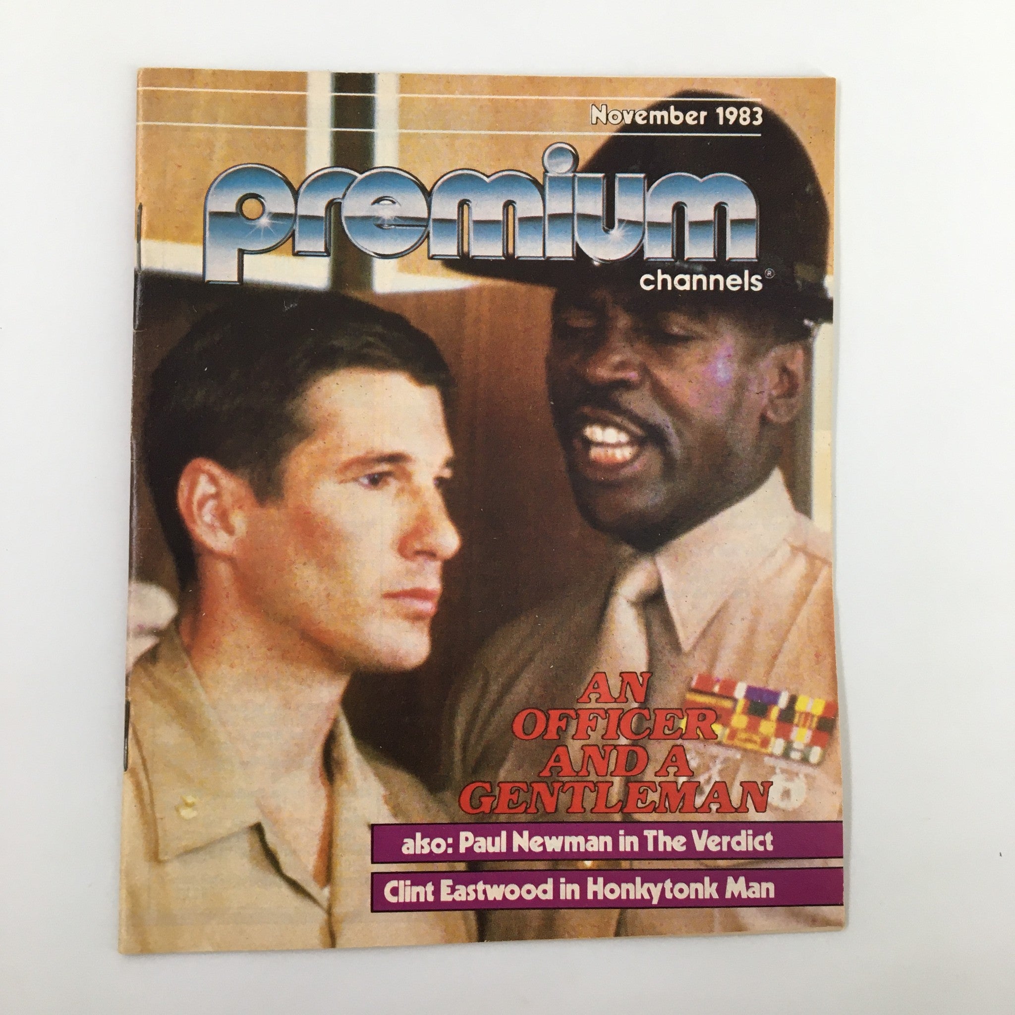 Cover of VTG Premium Channels Mini Magazine November 1983 featuring Richard Gere and Louis Gossett Jr. The cover promotes the film 'An Officer and a Gentleman' along with highlights of Paul Newman and Clint Eastwood.