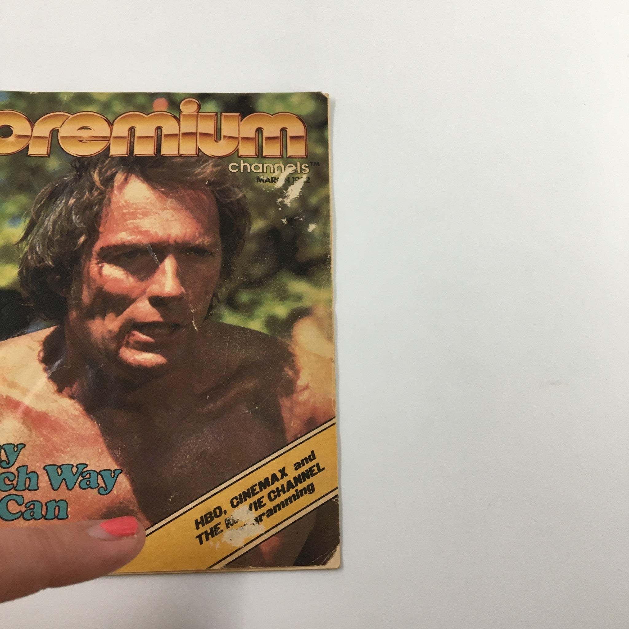 Cover of VTG Premium Channels Mini Magazine dated March 1982 featuring Clint Eastwood, showing him with a serious expression against a nature backdrop.