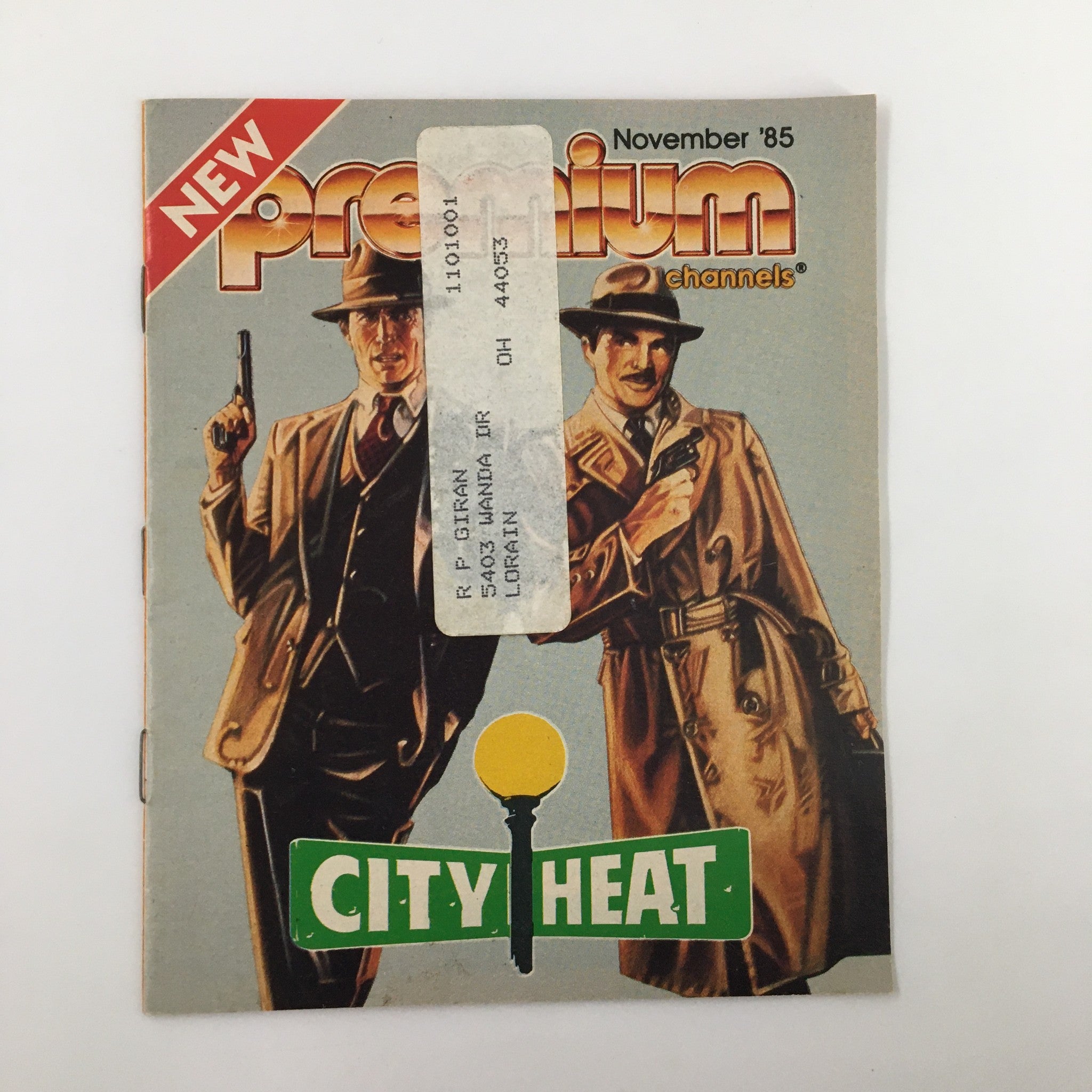 Cover of VTG Premium Channels Mini Magazine from November 1985 featuring iconic movie characters from 'City Heat' with a vintage aesthetic.