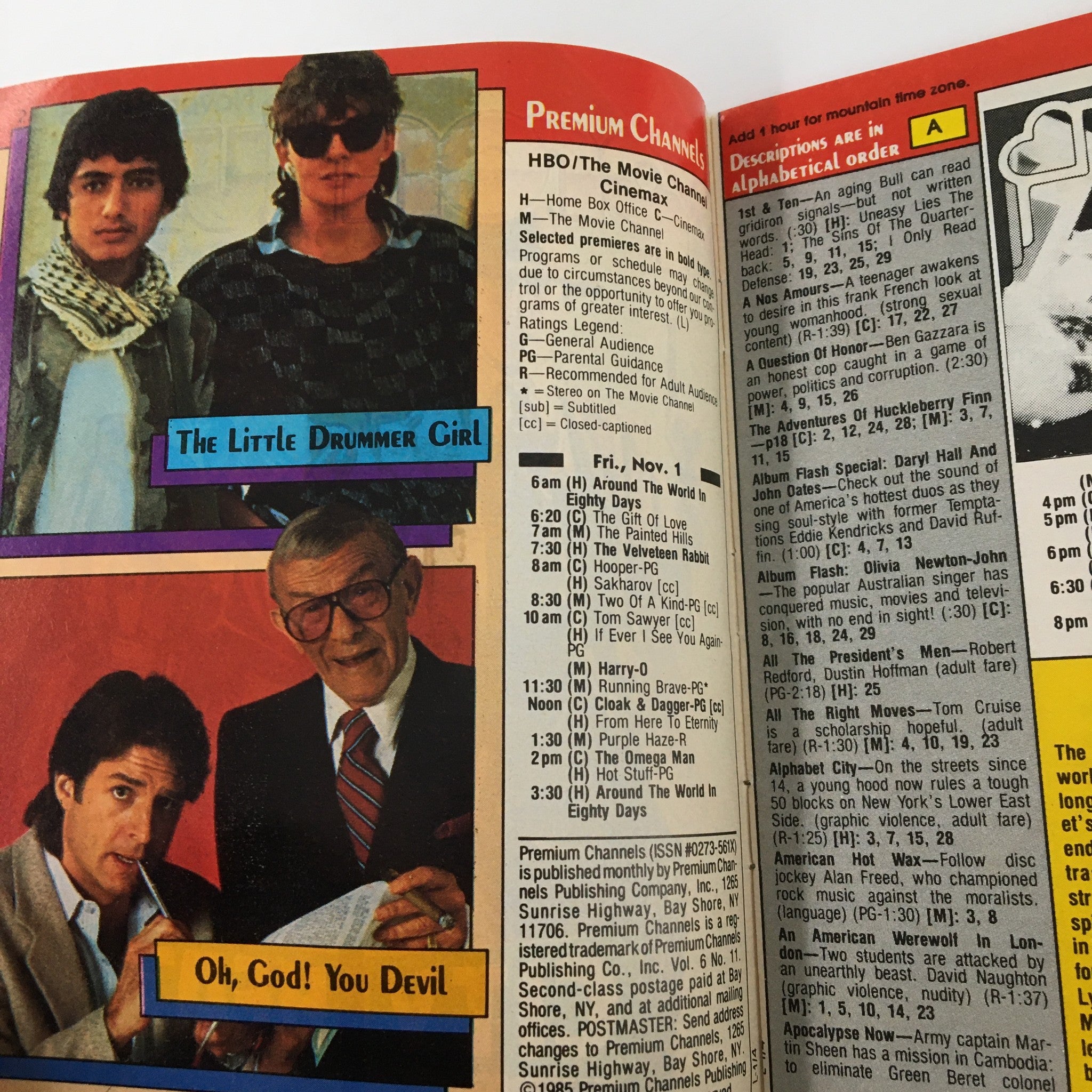 Interior page of VTG Premium Channels Mini Magazine November 1985 showcasing programming details with images from 'The Little Drummer Girl' and 'Oh, God! You Devil'.