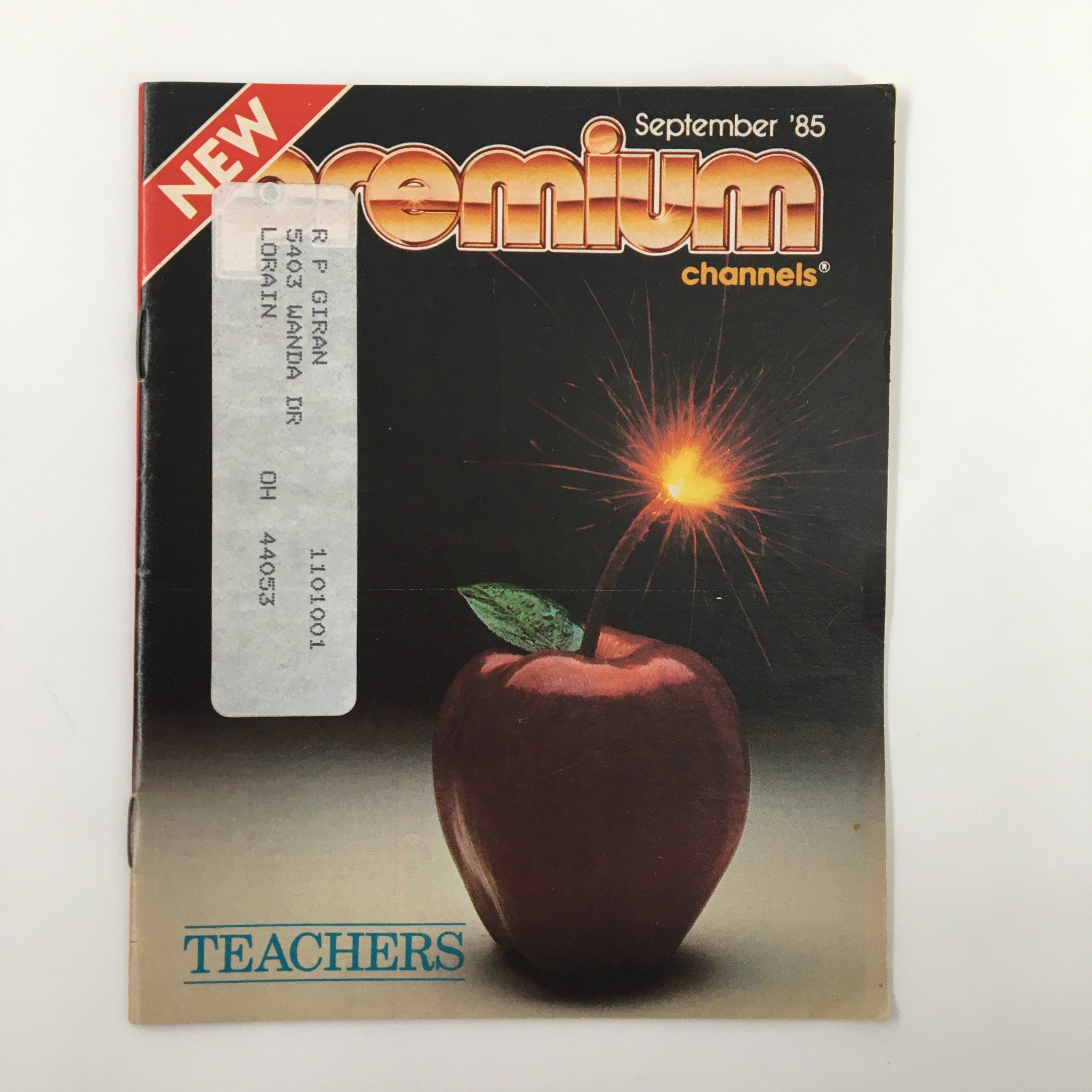Cover of VTG Premium Channels Mini Magazine from September 1985 featuring an artistic apple with a spark, highlighting Nick Nolte in the movie Teachers.