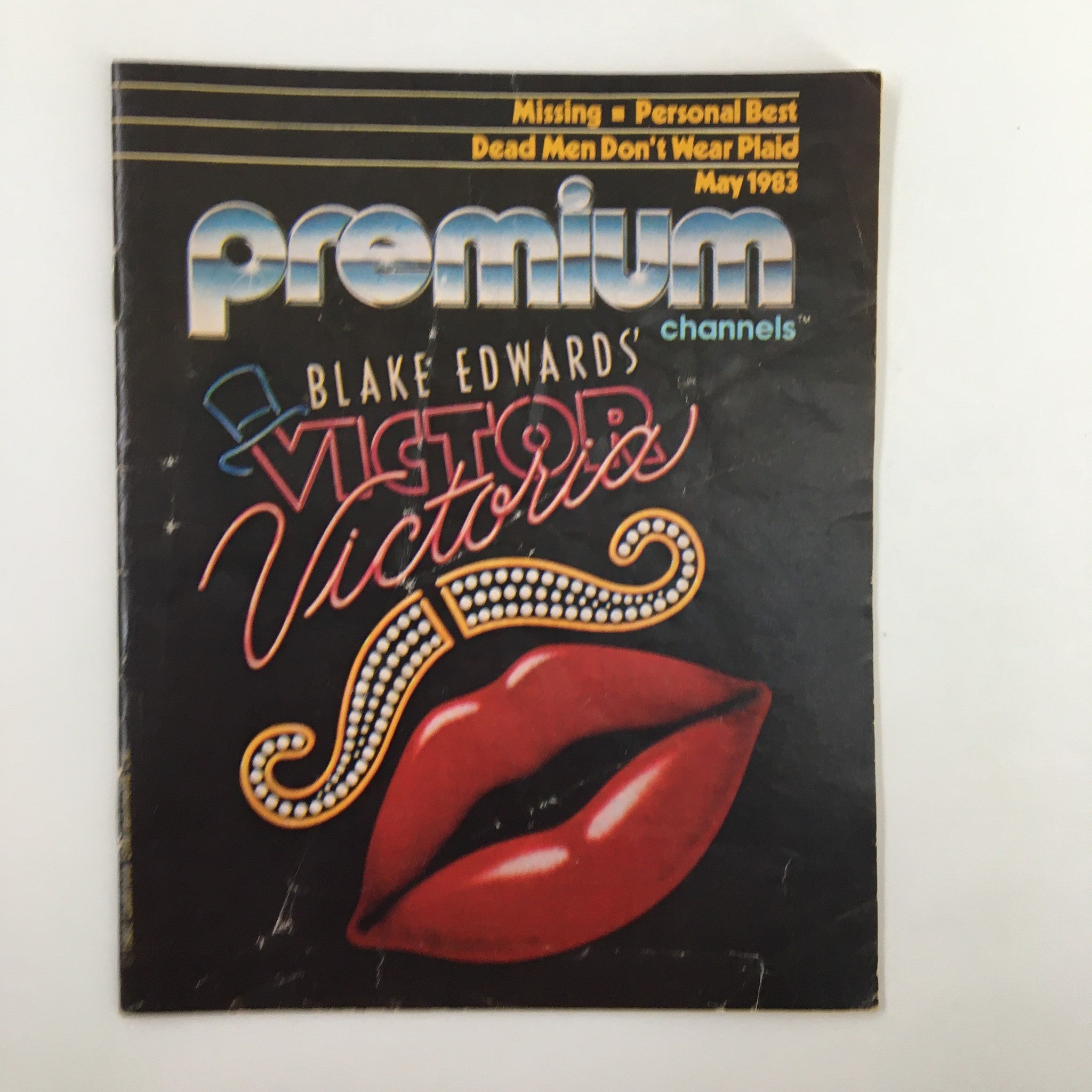Cover of VTG Premium Channels Mini Magazine from May 1983 featuring Blake Edwards' 'Victor Victoria', highlighting vibrant design with red lips and film title.