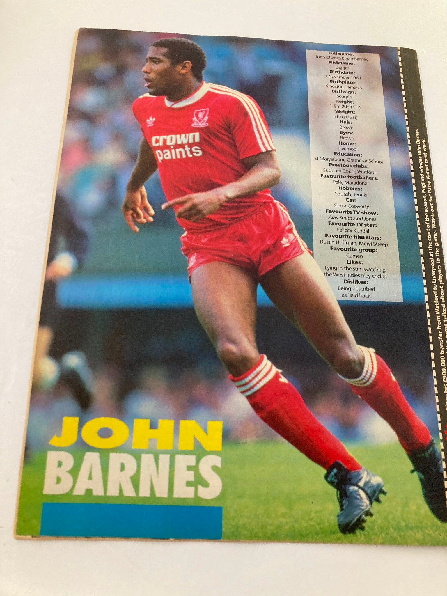 Vintage magazine cover of Lookin Magazine 1988 No. 14, featuring iconic pop culture references, with a focus on John Barnes in a Liverpool jersey. This image captures the nostalgic essence of the late '80s entertainment scene.