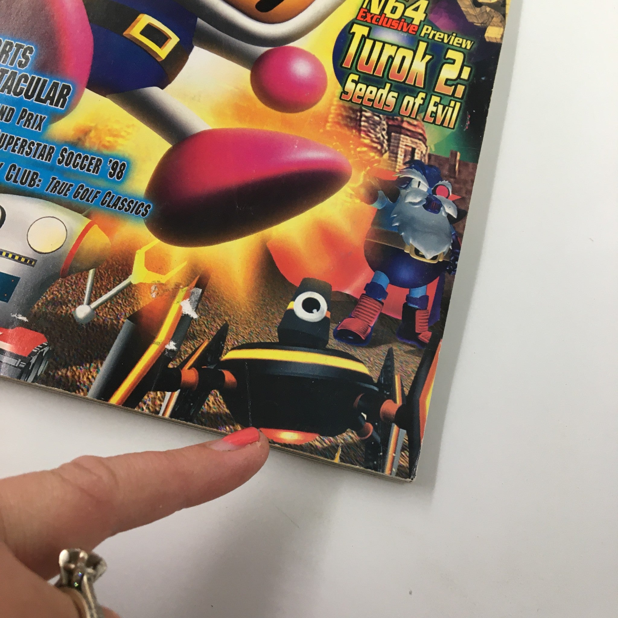Close-up of the cover of Nintendo Power Magazine #111 from August 1998 featuring Bomberman Hero, highlighting game graphics and characters.