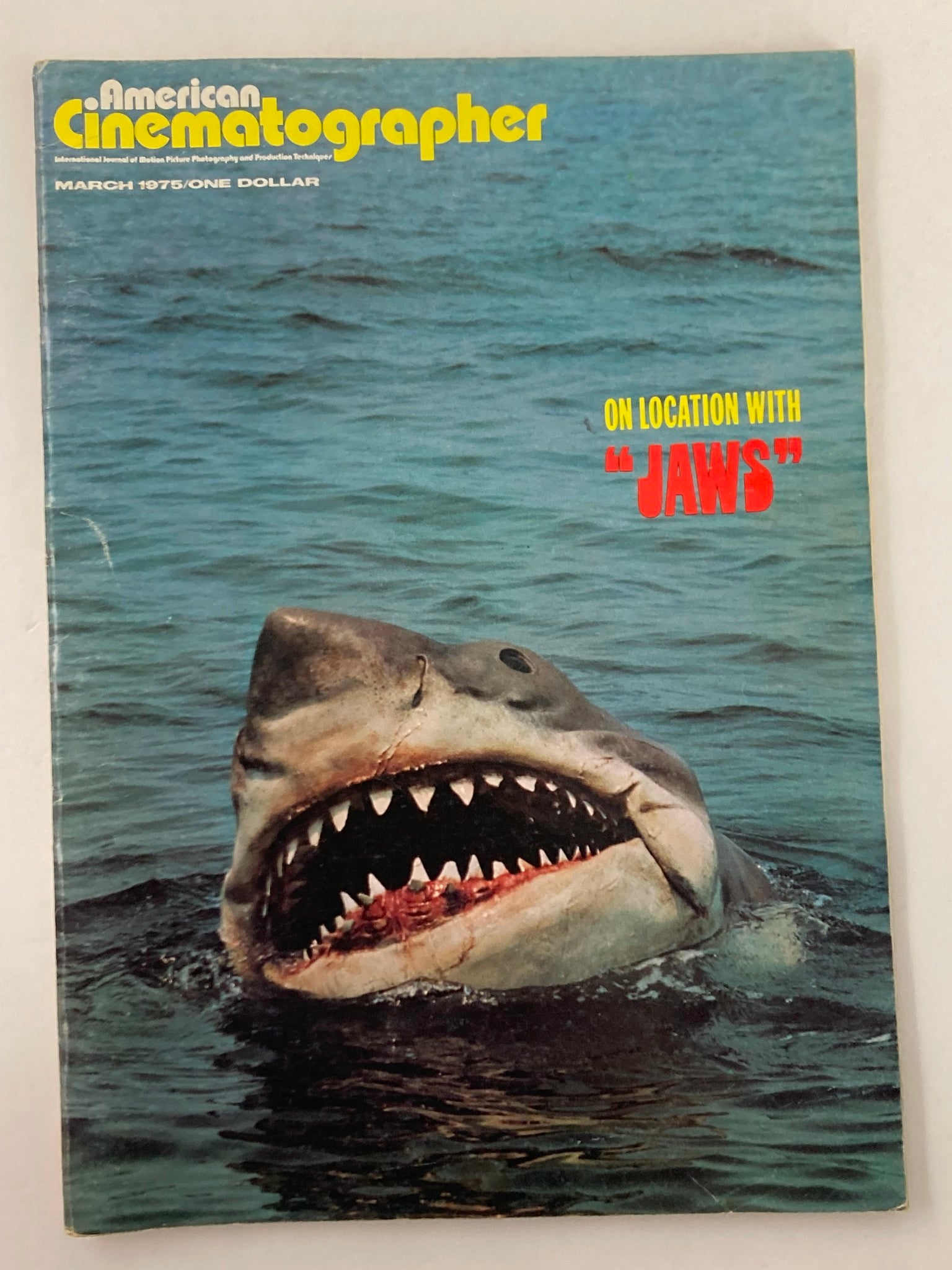 Cover of American Cinematographer Magazine, March 1975 issue, featuring the mechanical Great White Shark from the filming of Jaws