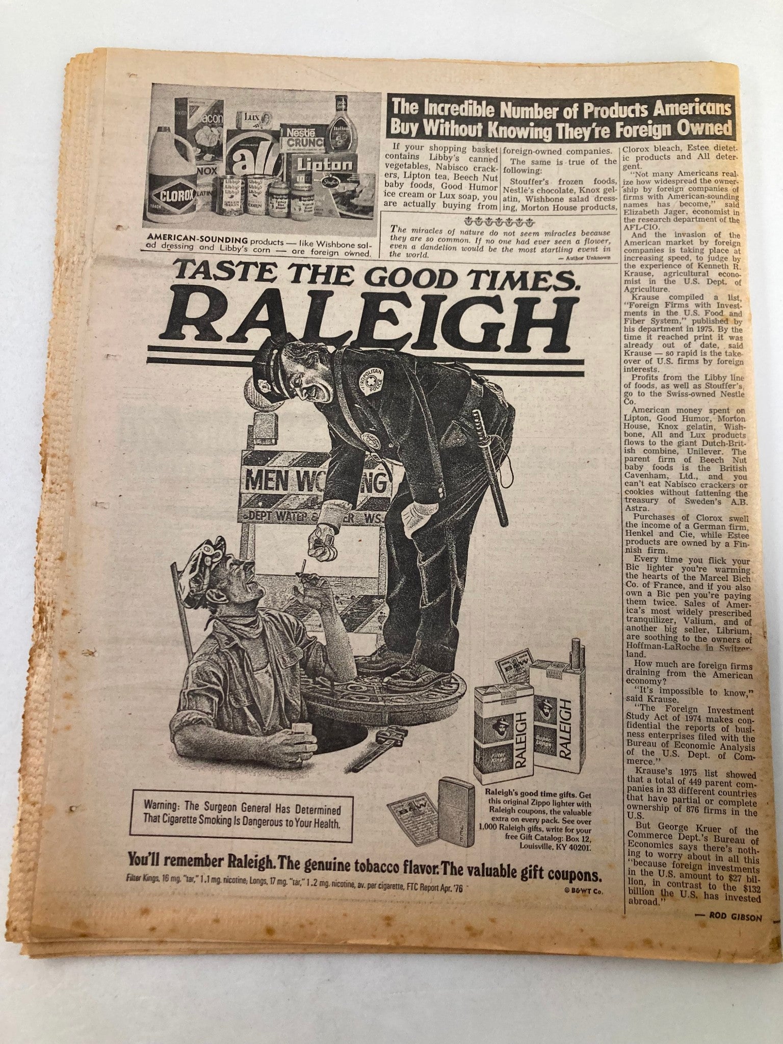 National Enquirer Tabloid January 18 1977 highlighting an advertisement for Raleigh cigarettes with the message 'Taste the Good Times' and a warning about health risks related to smoking.