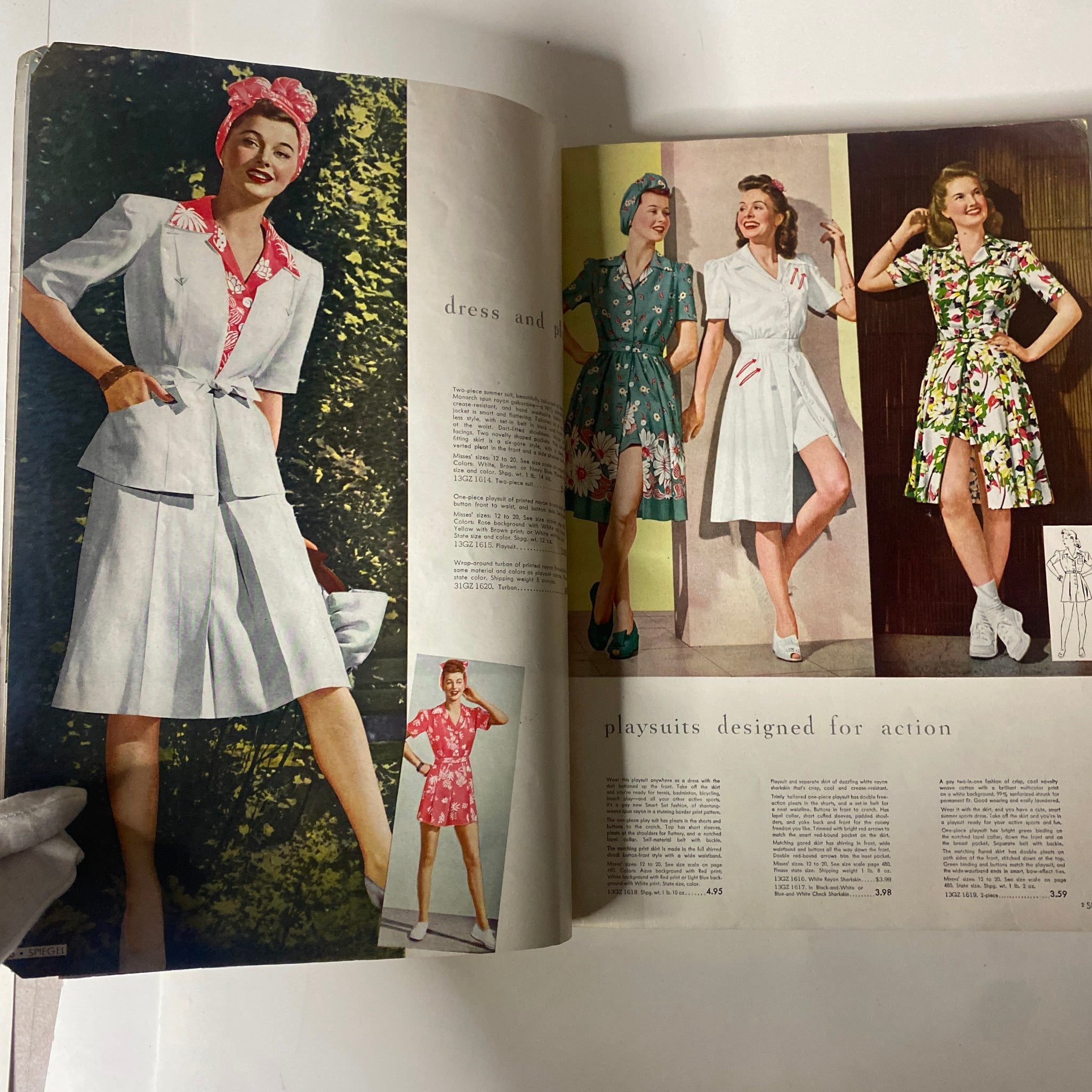 Interior pages of the 1943 Spiegel Spring and Summer Catalog showcasing stylish women's dresses, including floral and patterned designs.