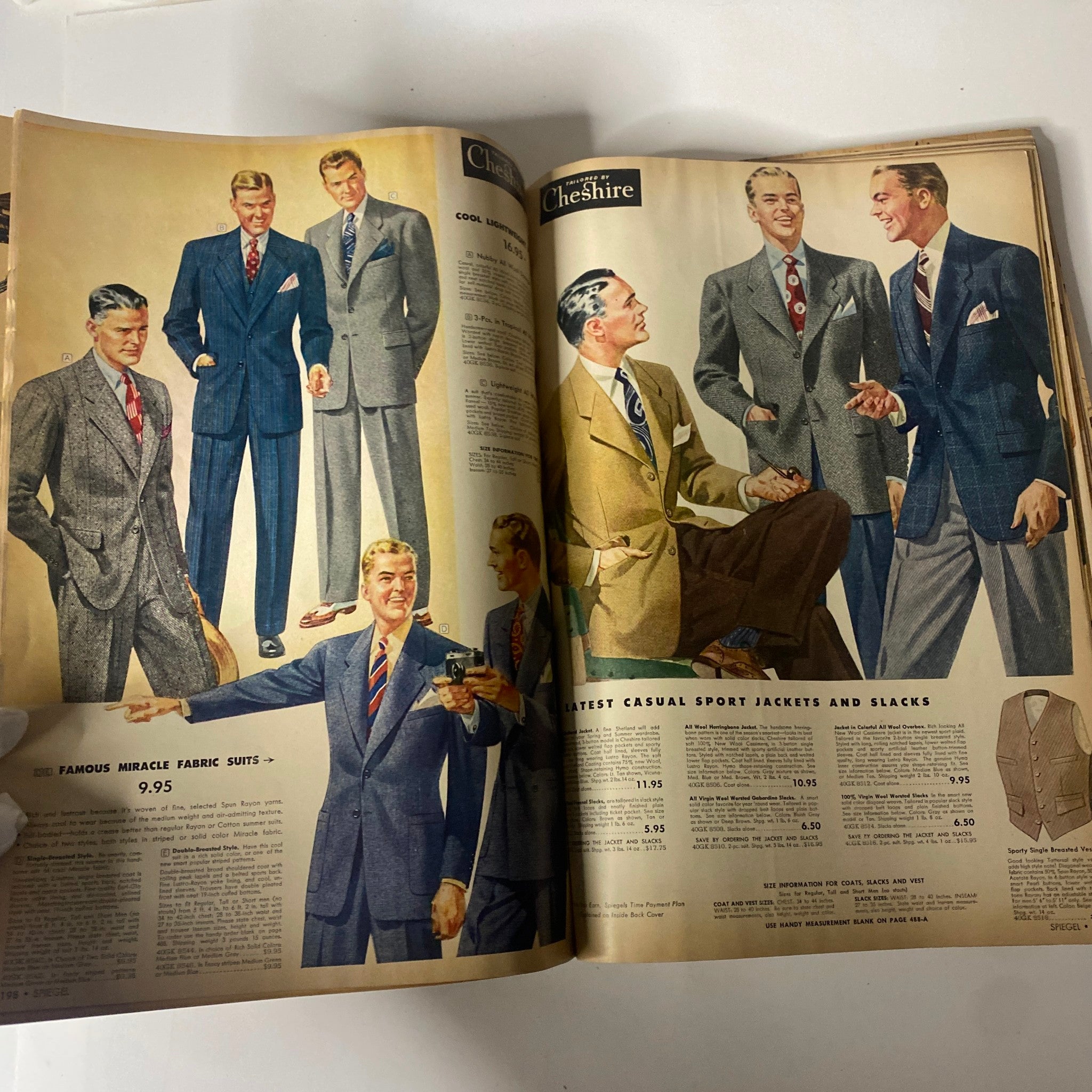 1943 Spiegel Spring and Summer Catalog presenting various men's suits and sport jackets, illustrating fashion trends from the mid-20th century.