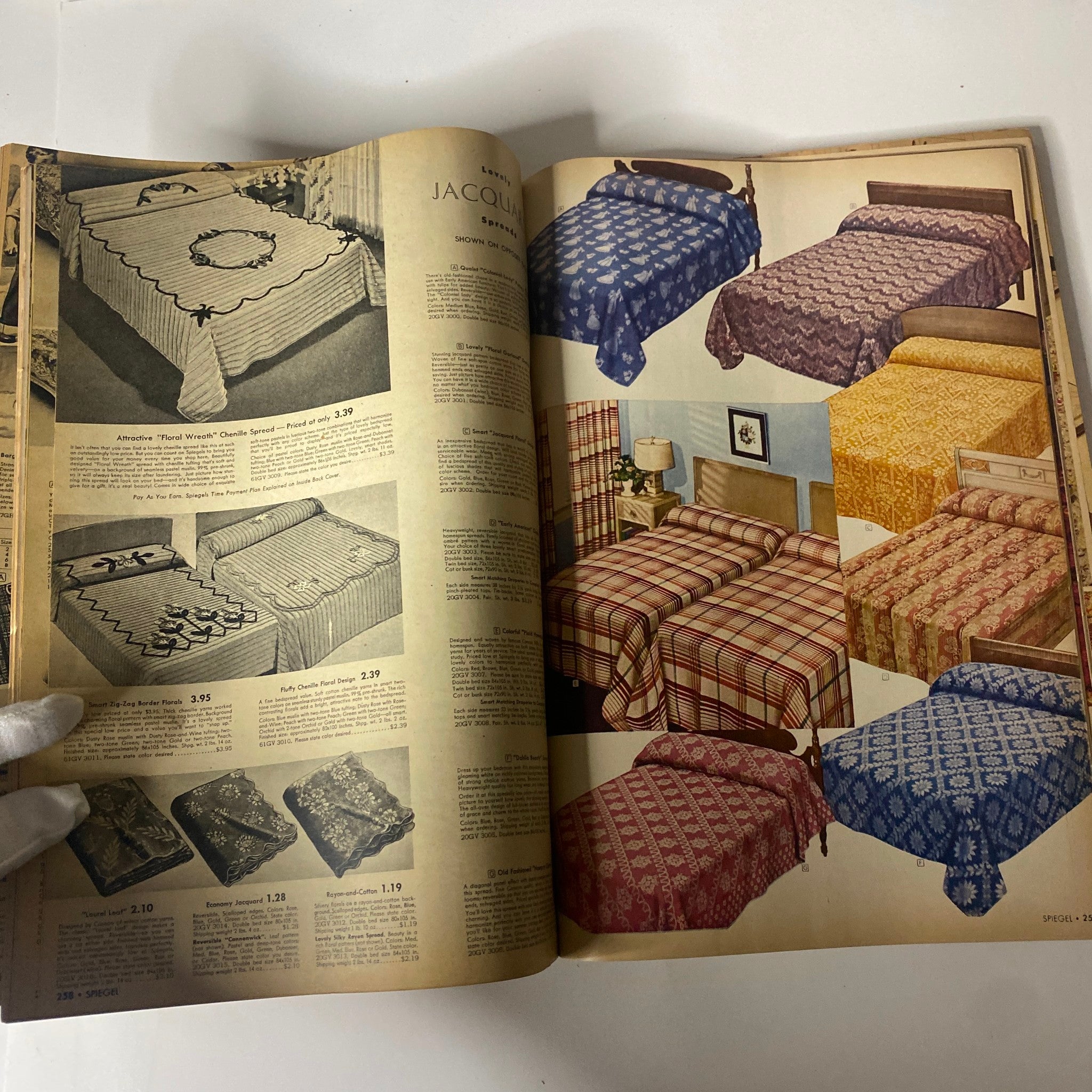 1943 Spiegel Spring and Summer Catalog featuring bed coverings and spreads, displaying various designs and patterns for mid-century home decor.