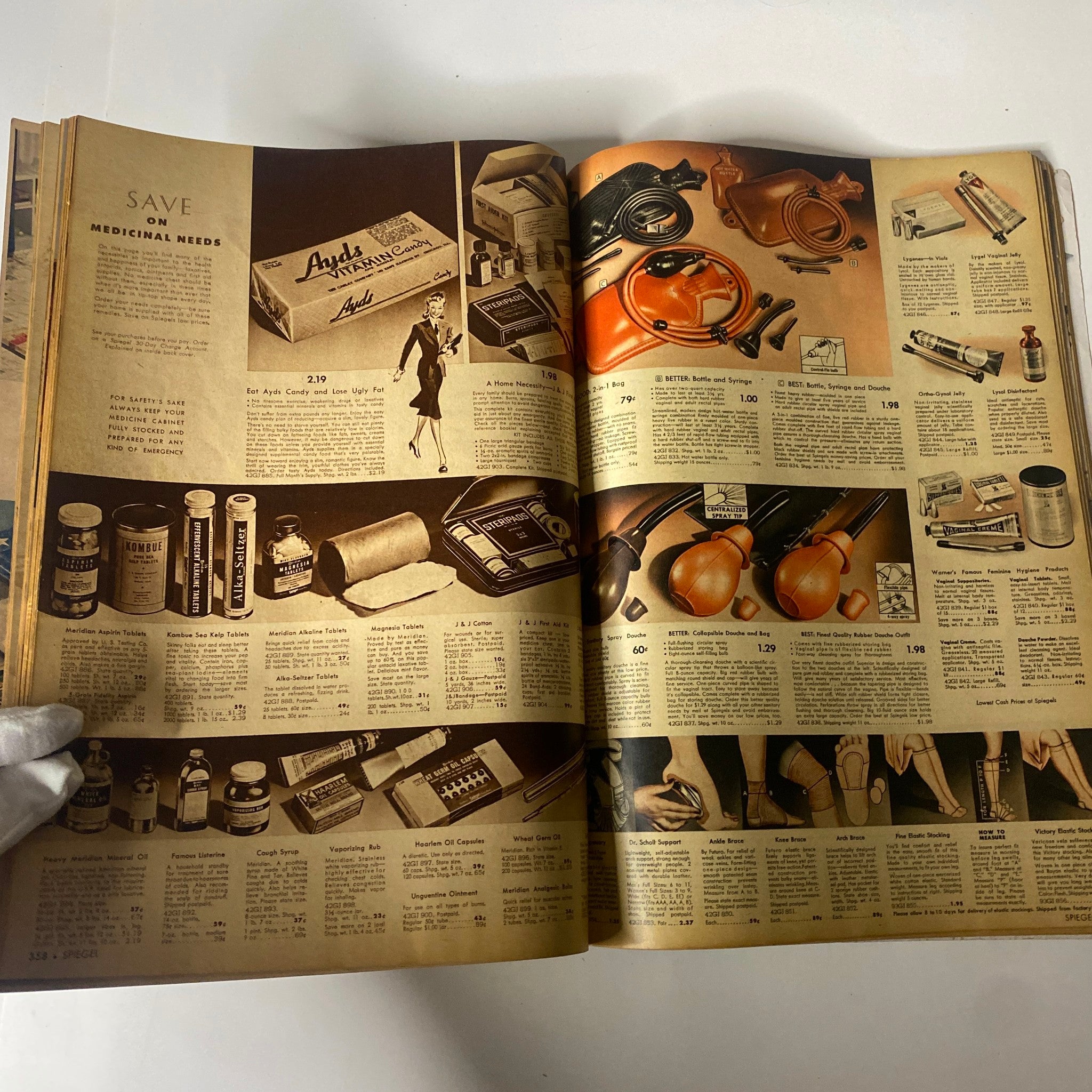 Interior page from the 1943 Spiegel Spring and Summer Catalog displaying medicinal products and accessories, highlighting wartime health solutions and household needs.