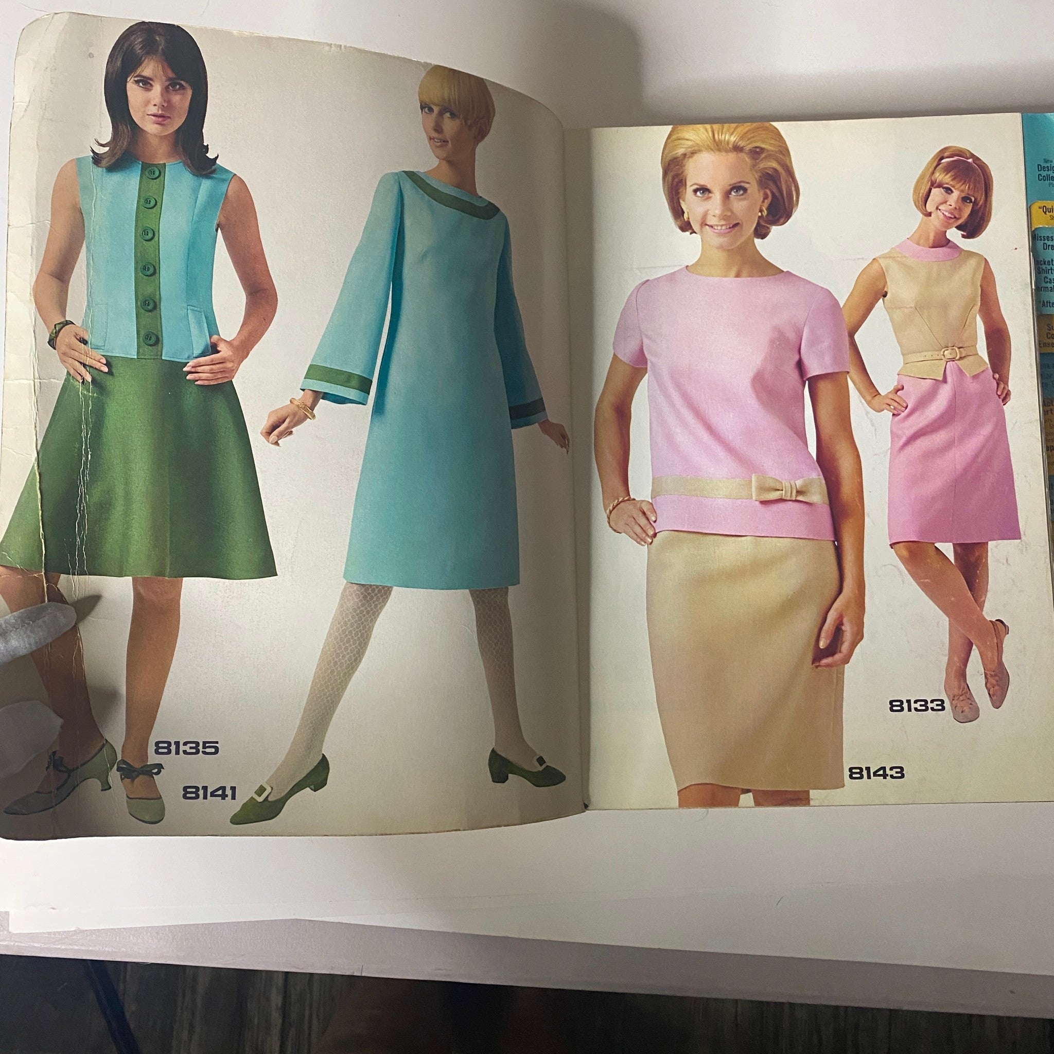 Interior page of the 1966 February McCall's Designers' Collection catalog displaying various sewing patterns for women's fashion, including dresses and tops in retro styles.
