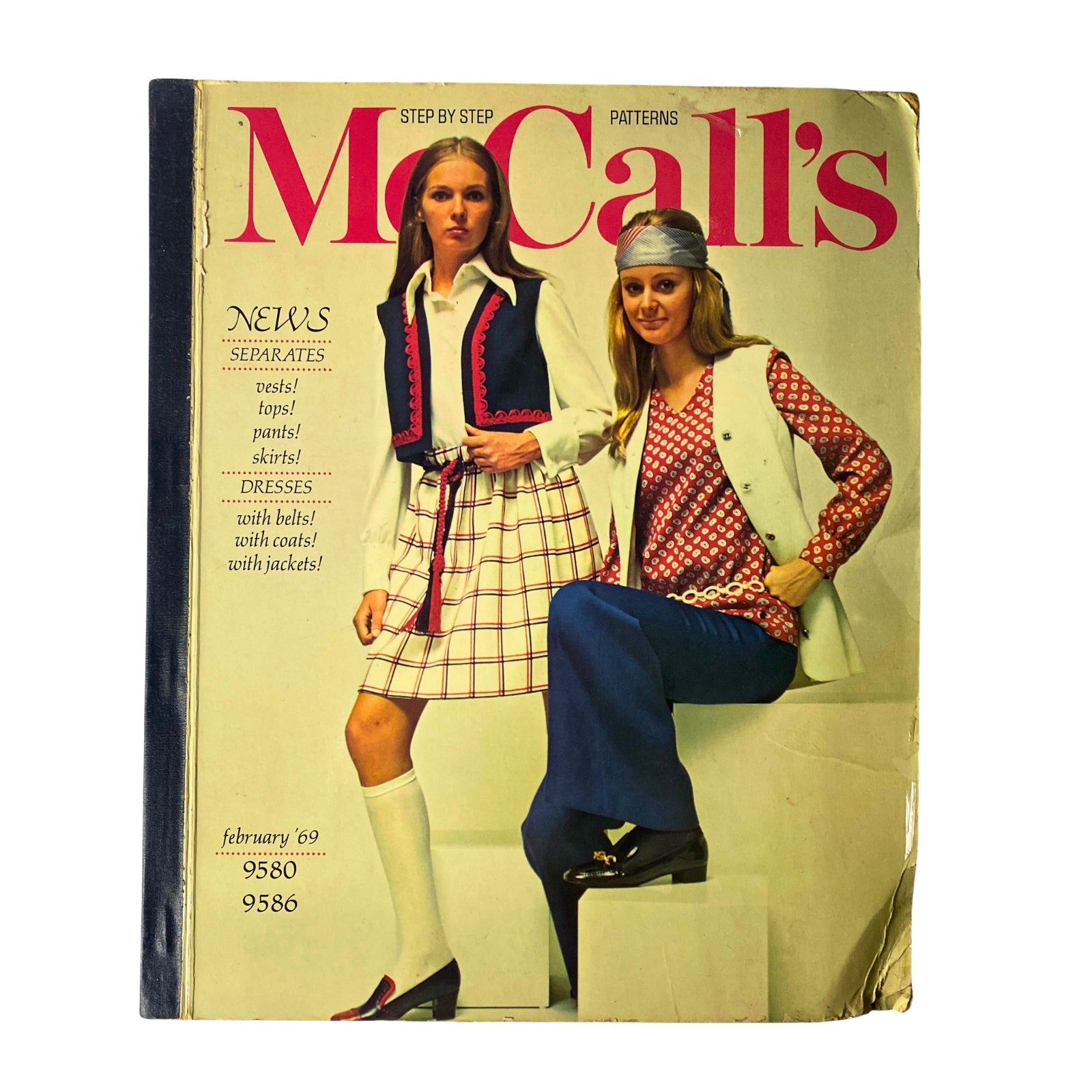 Cover of the 1969 February McCall's Step by Step Patterns Catalog featuring two models showcasing 1960s fashion. The left model wears a vest, checkered skirt, and knee-high socks, while the right model dons a patterned top and trousers. This vintage catalog highlights sewing patterns for misses' and junior dresses, separates, sportswear, and more.