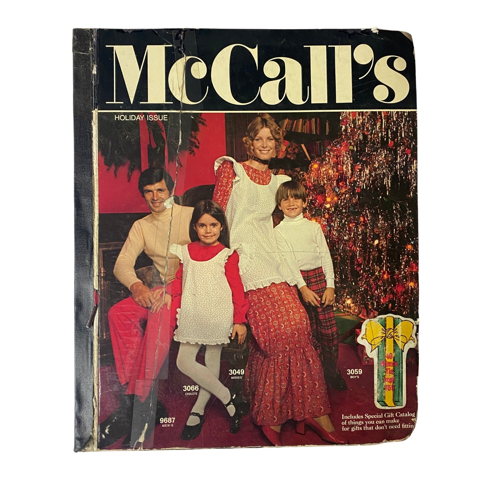 1971 McCall's Christmas Holiday Issue featuring a family on the cover, showcasing holiday fashions, with a tree in the background.