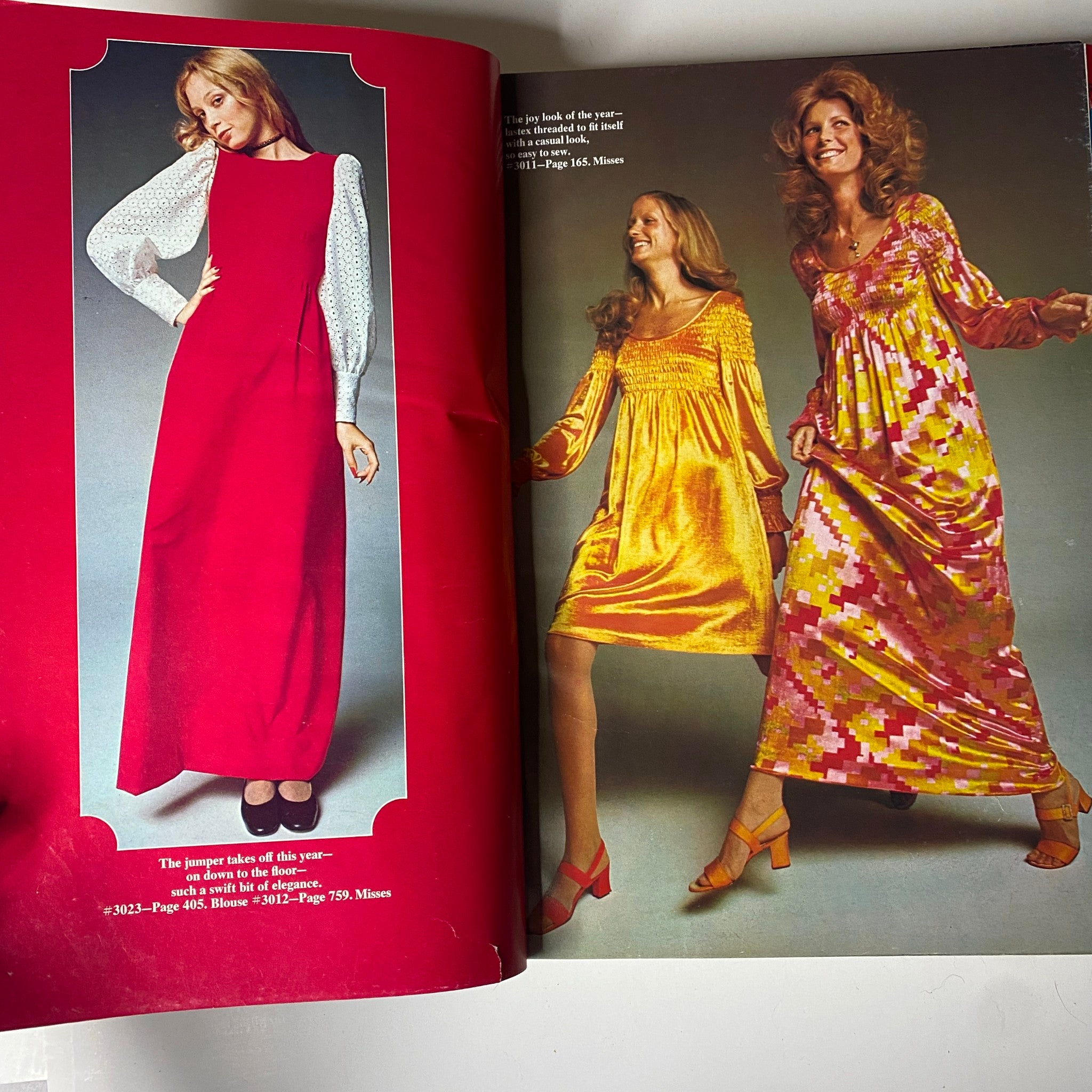 Fashion spread from the 1971 McCall's Christmas Holiday Issue featuring women's dresses and ensembles in festive colors and styles.