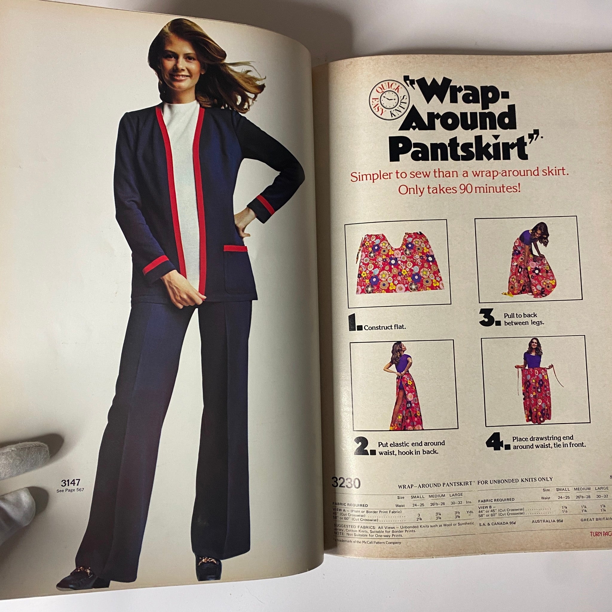 1972 April McCall's catalog showcasing a model in a stylish navy suit with red accents alongside instructions for a wrap-around pants skirt. Highlights DIY fashion trends of the 1970s.