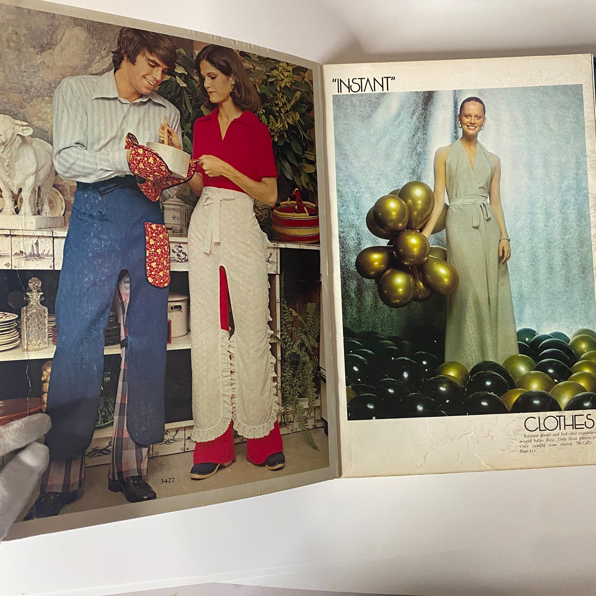 Inside pages of the 1972 McCall's Holiday Huge Store Retail Counter Catalog showcasing models in elegant 1970s holiday attire and festive decorations.