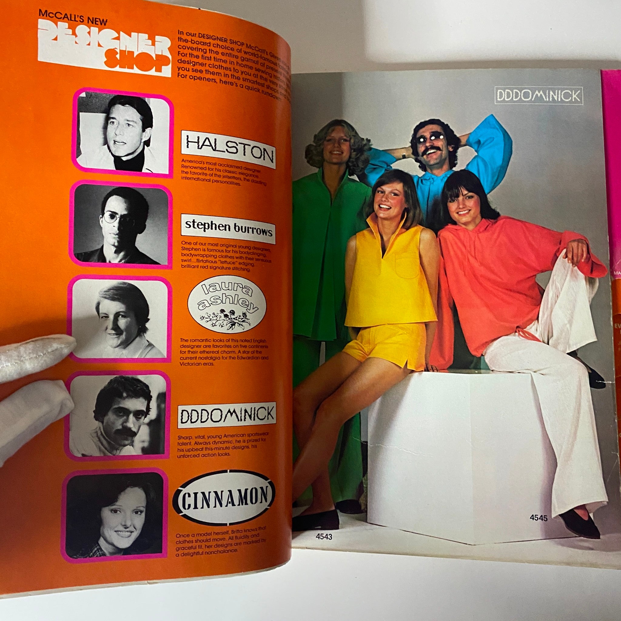 1975 Carefree Patterns McCall's Summer Catalog featuring a colorful photoshoot with models showcasing relaxed fashion styles including designer outfits by Halston, Steven Burrows, and more.