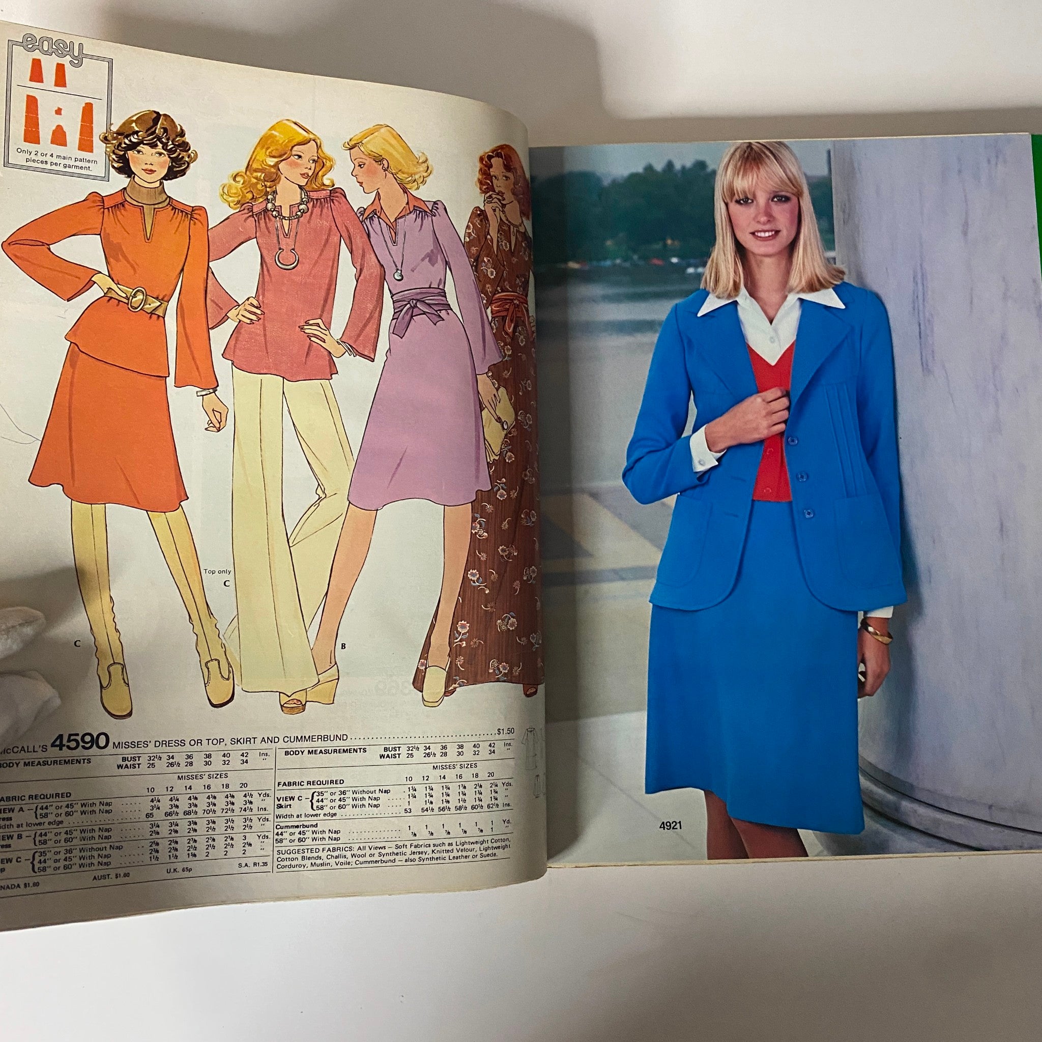 1976 April Carefree Patterns McCall's Spring Huge Store Retail Counter Catalog showcasing a variety of women's sewing patterns, including dresses and suits, reflecting mid-1970s fashion styles.