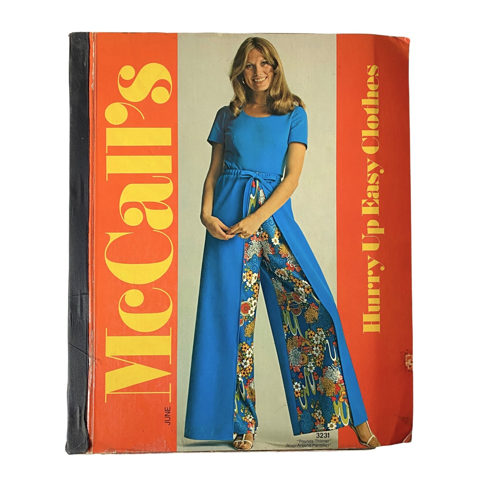 1970s McCall's Hurry Up Easy Clothes Catalog featuring a model in a blue outfit with colorful patterned pants, showcasing vintage fashion styles from the 1970s.