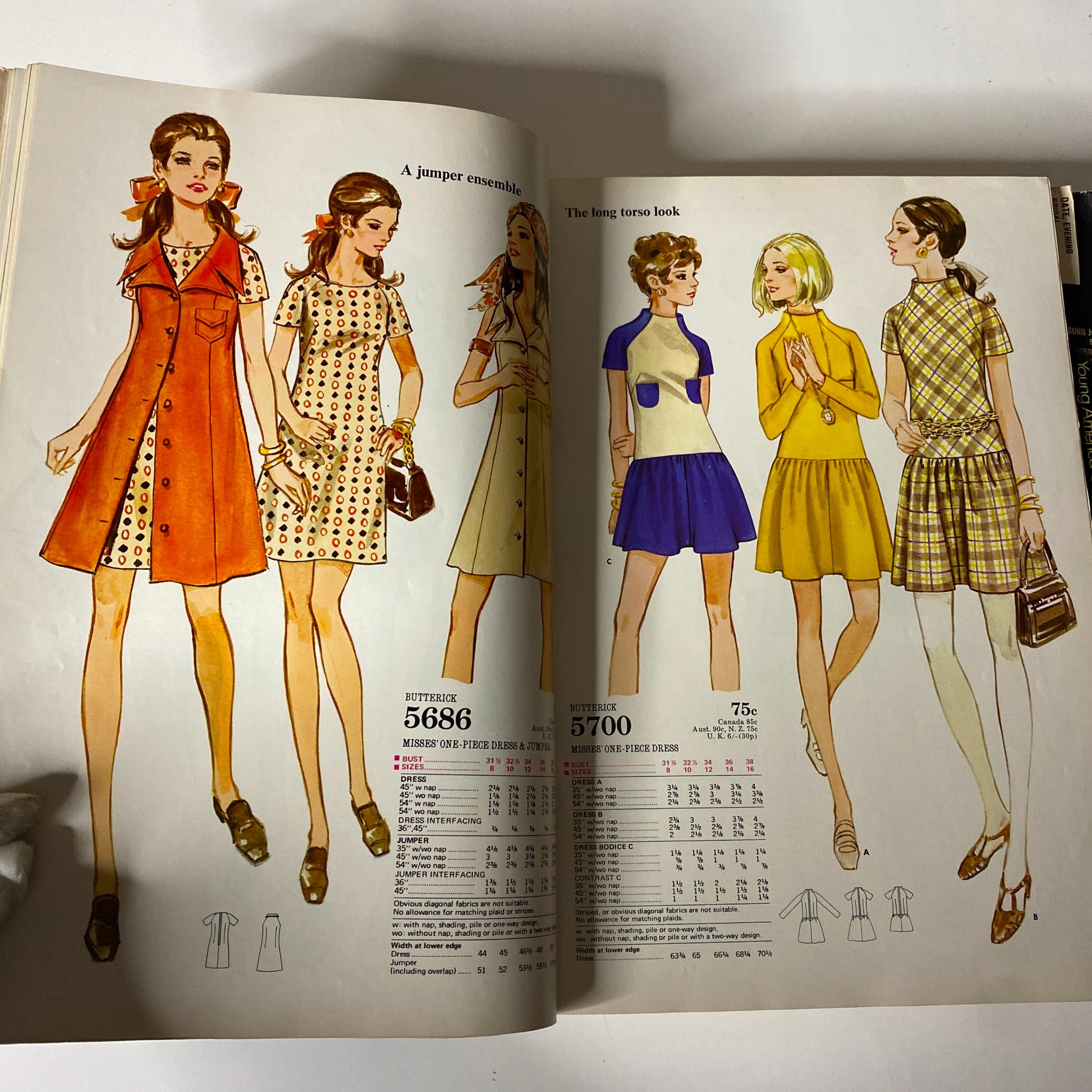 A page from the 1970 July Butterick Catalog featuring colorful Misses and Junior dress patterns including a jumper ensemble and designs highlighting the long torso look.