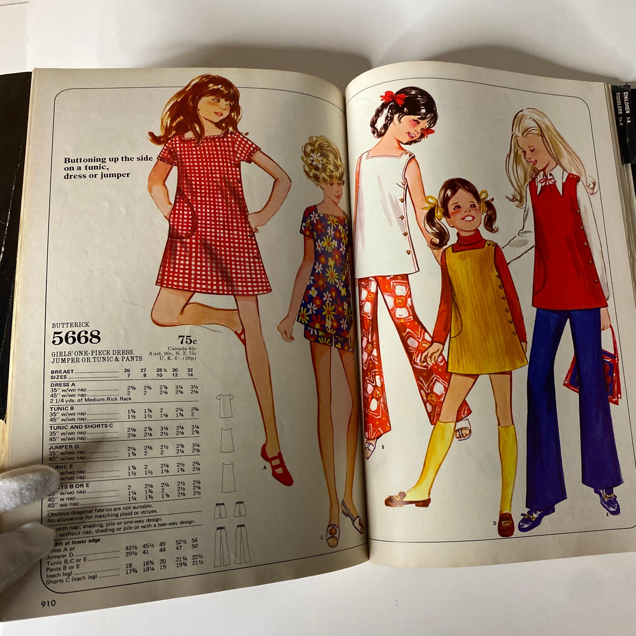 A vibrant page from the 1970 July Butterick Catalog featuring trendy girls' dress patterns, jumpers, and pants in retro styles, ideal for collectors and sewing enthusiasts.