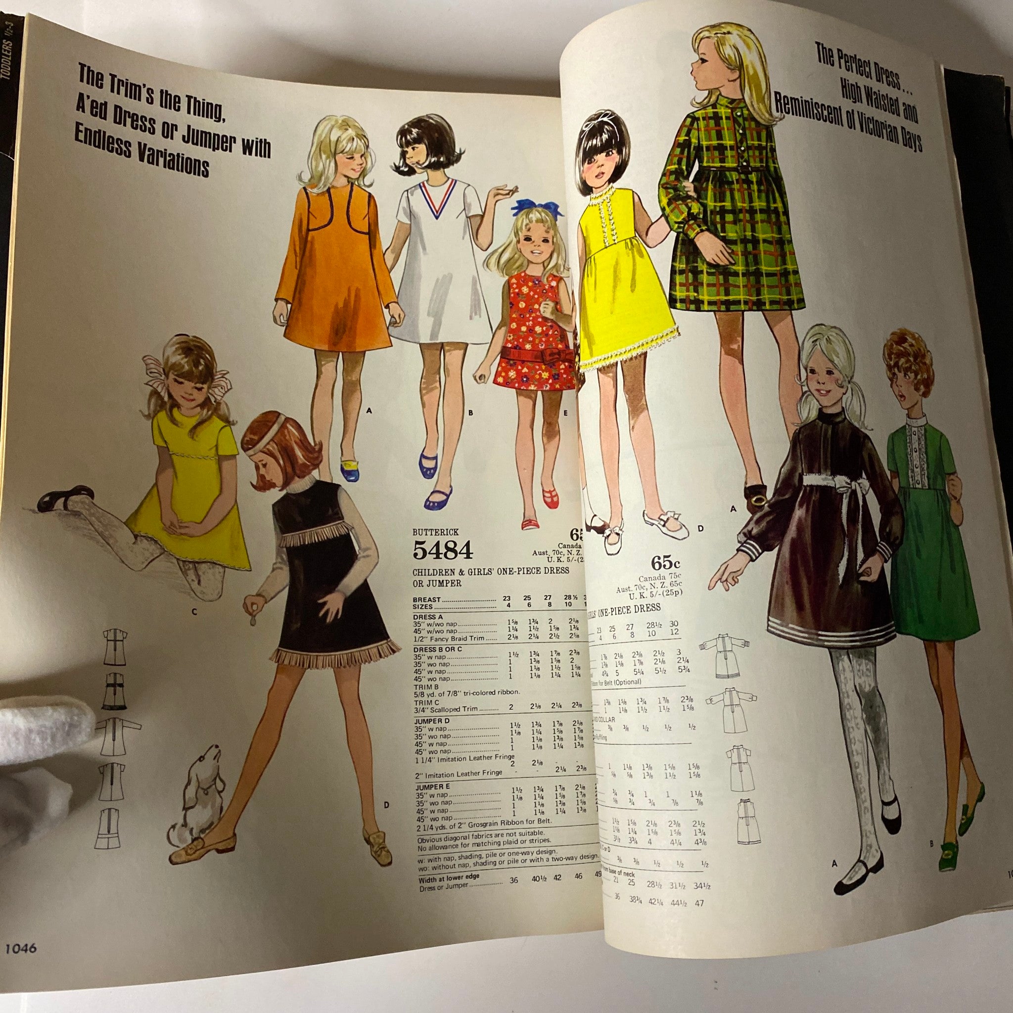 1970 July Butterick Catalog featuring children's and girls' one-piece dresses or jumpers with various styles, showcasing playful patterns and retro fashion trends.