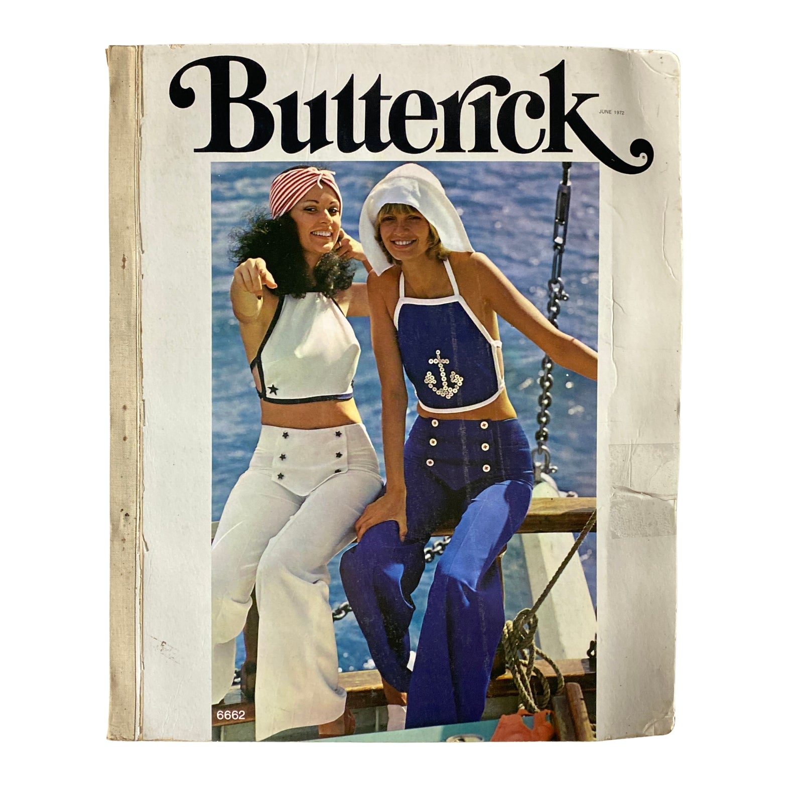 Cover of the 1972 June Butterick Miss Petite Catalog featuring two women modeling stylish summer outfits on a boat. The catalog showcases proportioned sewing patterns for petite sizes, combining vintage fashion with tailor-made designs.