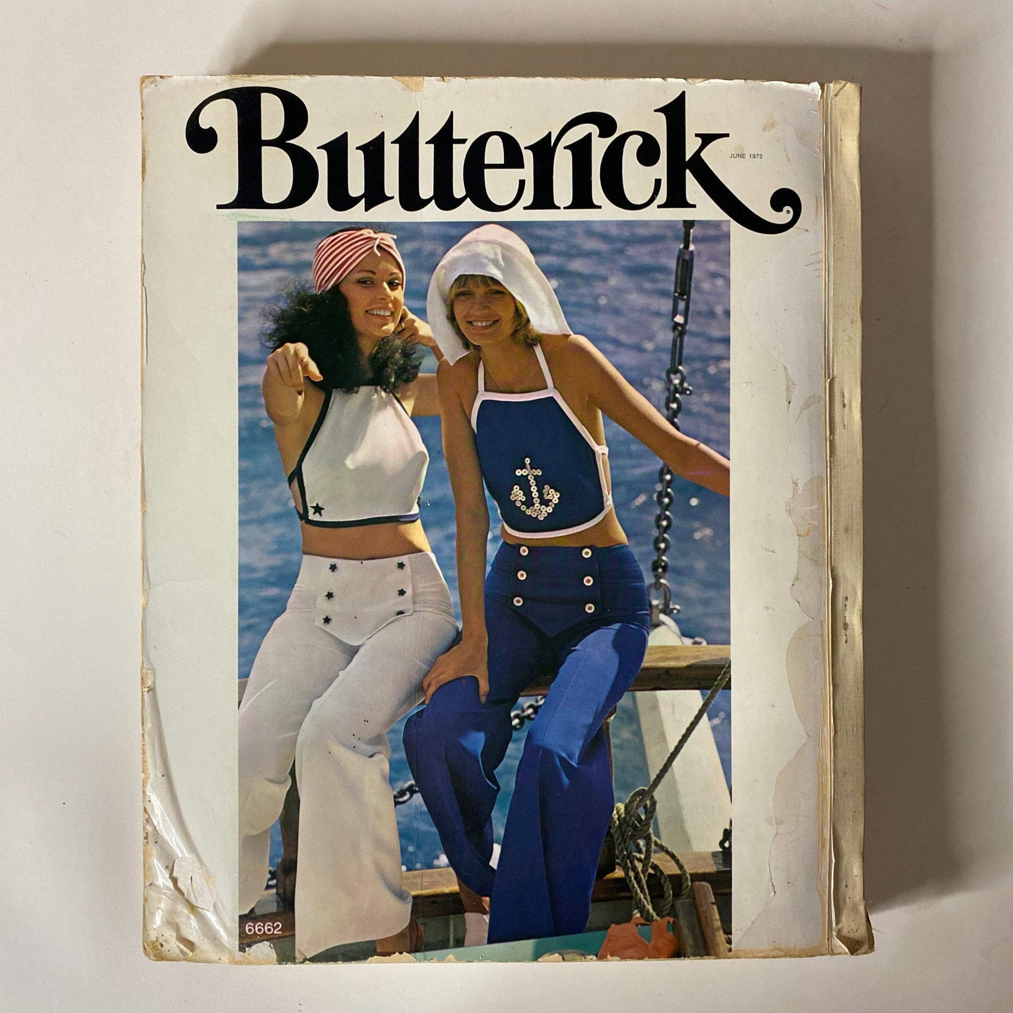 Cover of the 1972 June Butterick Miss Petite Catalog featuring two women in nautical-themed outfits, highlighting retro fashion styles for petites.