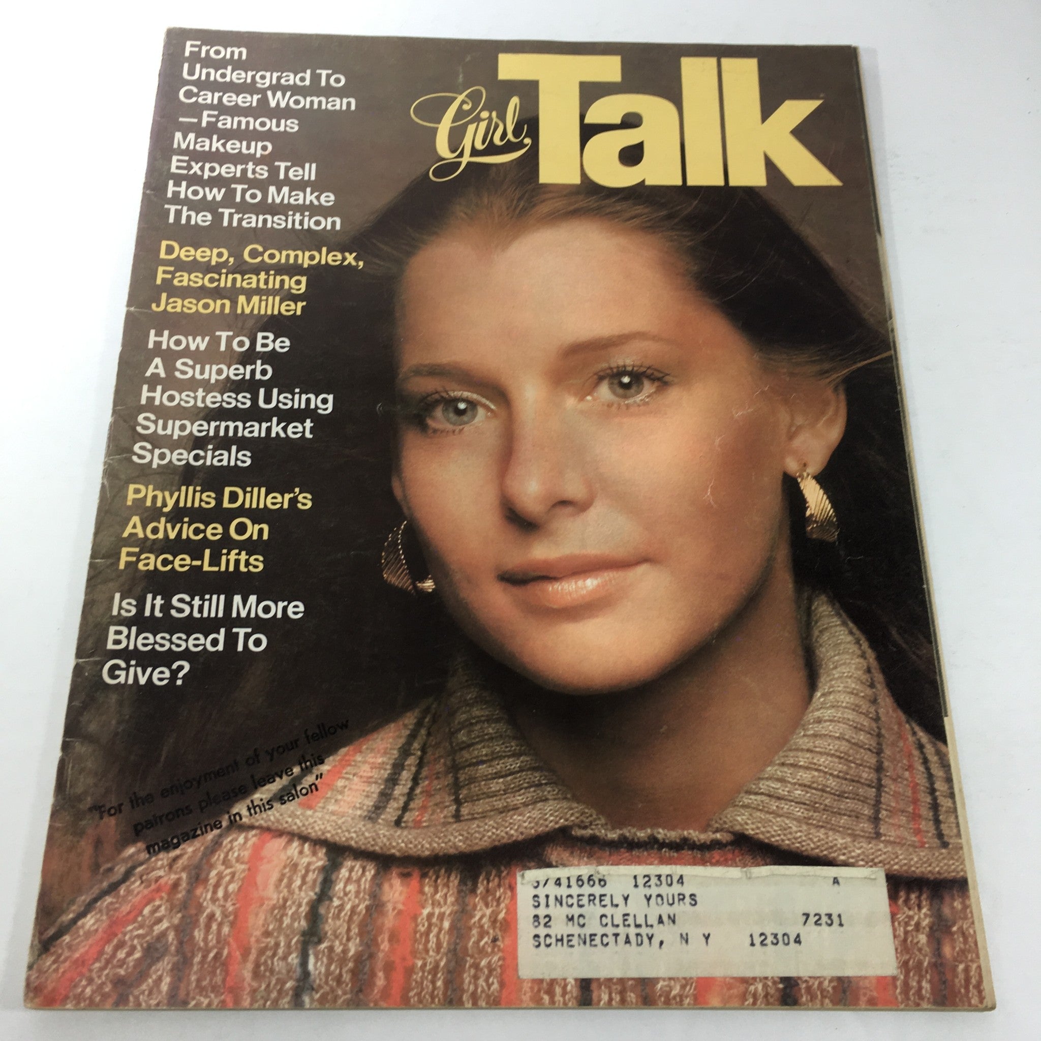 Cover of the VTG Girl Talk Magazine: October 1975 featuring Phyllis Diller's advice on face-lifts, showcasing a woman with prominent earrings and a stylish sweater. The magazine hints at articles on beauty, makeup, and transitioning to a career woman.
