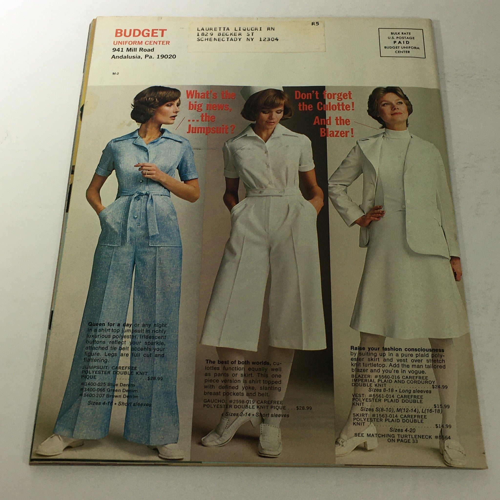 Cover of VTG Budget Store Catalog Winter 1977, featuring models in stylish 70s clothing with an address label adding authenticity.