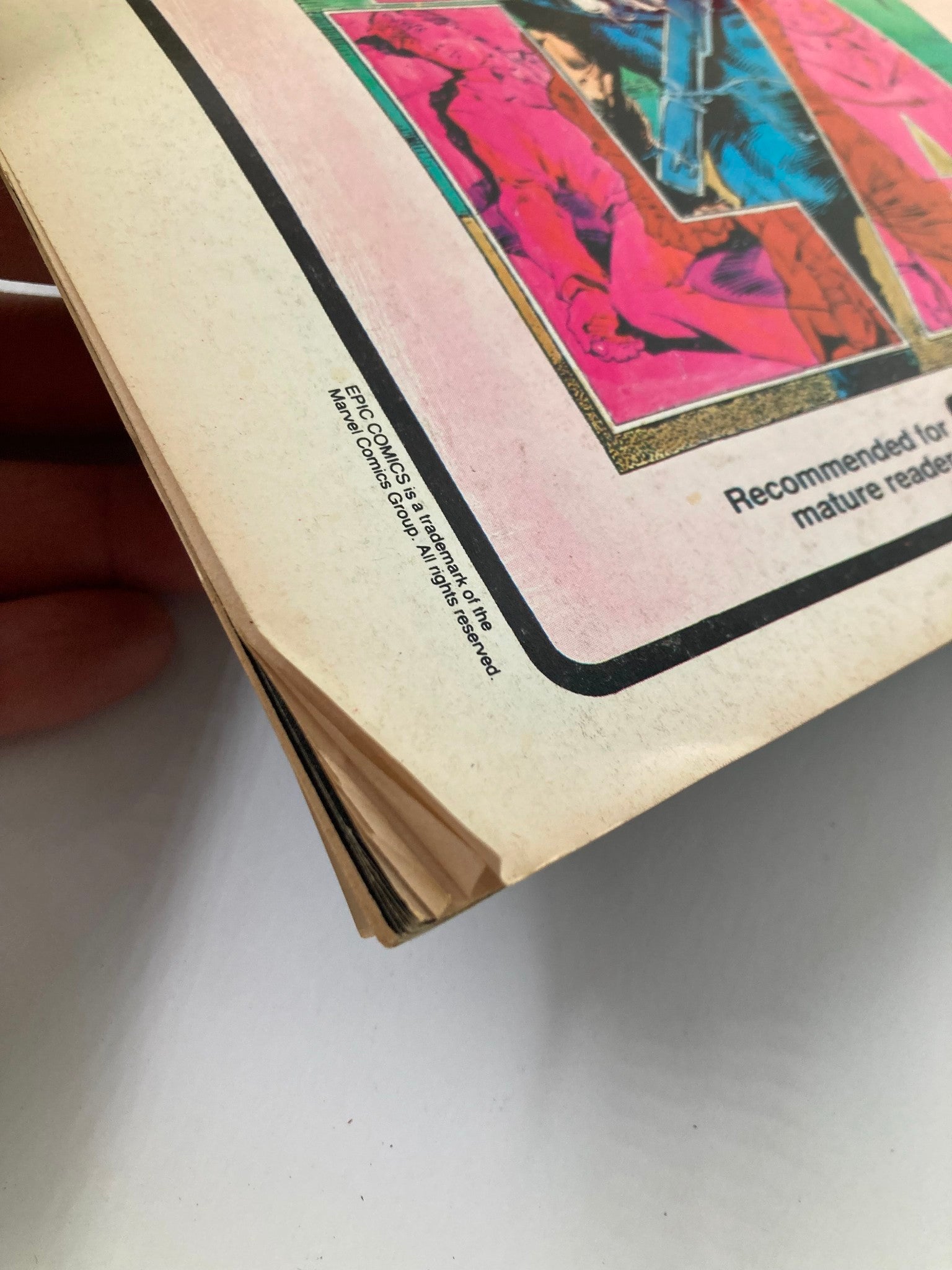 Back cover detail of Epic Illustrated Magazine December 1984, highlighting a recommended label for mature readers and showcasing the vibrant artwork. This detail reflects the magazine's unique design and serves as part of the VTG Epic Illustrated Magazine featuring 'The Last Galactus Story'.