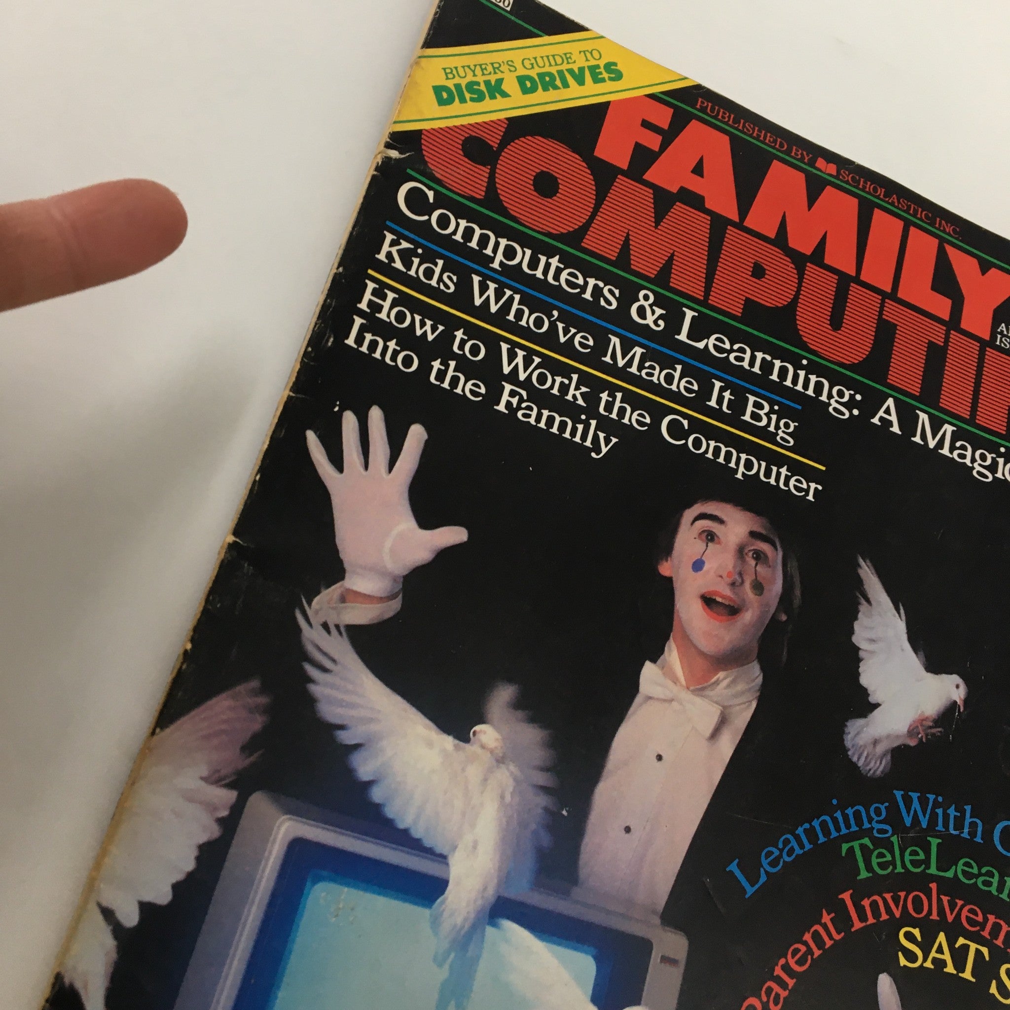 Close-up of Family Computing Magazine September 1984 cover showcasing a magician with doves and text on learning with computers, emphasizing original programs for various home computers.