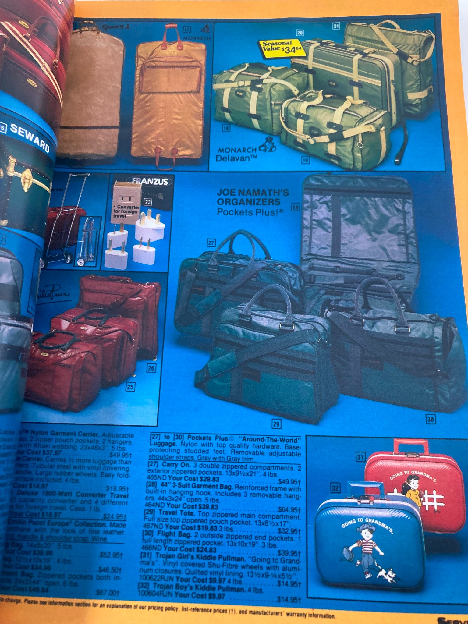 Luggage and travel accessories from the 1984 Service Merchandise Spring and Summer Catalog, highlighting various styles of bags and organizational products against a colorful blue background.