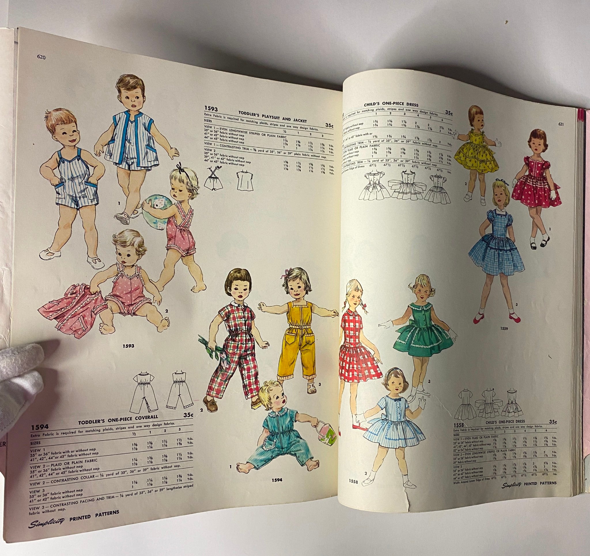1956 May Simplicity Sewing Pattern Catalog presenting playful toddler dresses and playsets, showcasing charming designs for children's wear in colorful fabric choices.