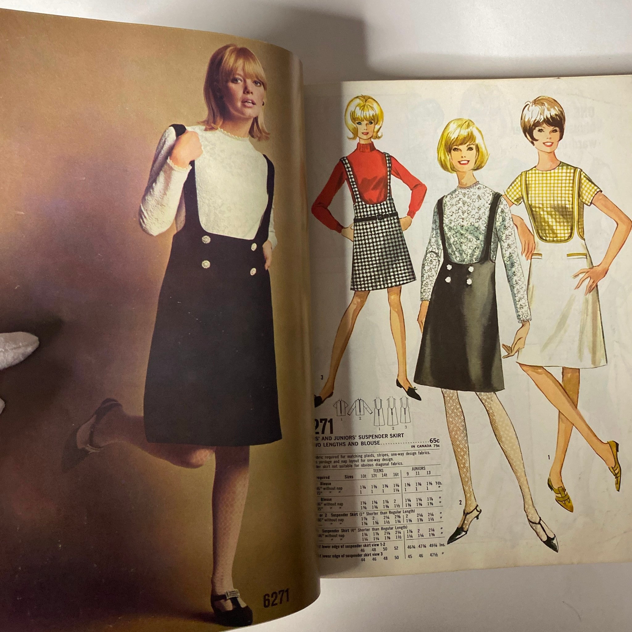 1965 December Simplicity Christmas Catalog featuring a model in a black suspender skirt paired with a white top, showcasing holiday sewing patterns for women and juniors.