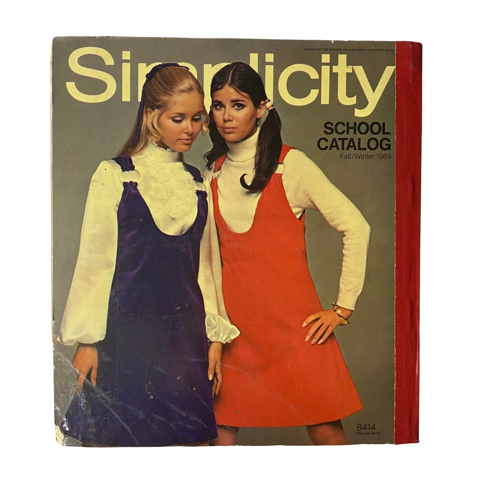 1969 Simplicity Fall and Winter School Catalog cover, displaying two young women modeling colorful dresses, emphasizing vintage fashion styles from the late 1960s.
