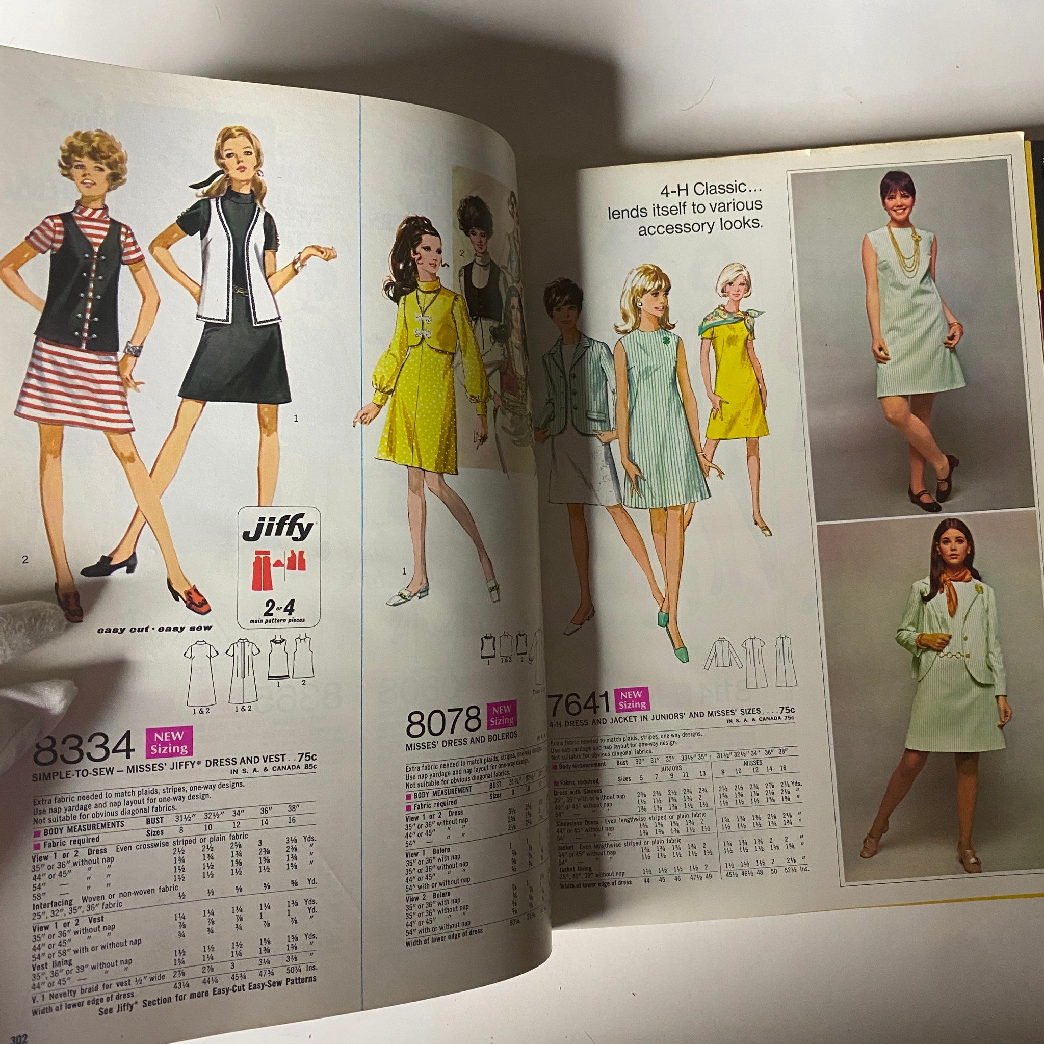 Inside the 1970 March Simplicity Spring Catalog featuring a range of sewing patterns, including dresses and vests, along with models showcasing classic 70s looks.