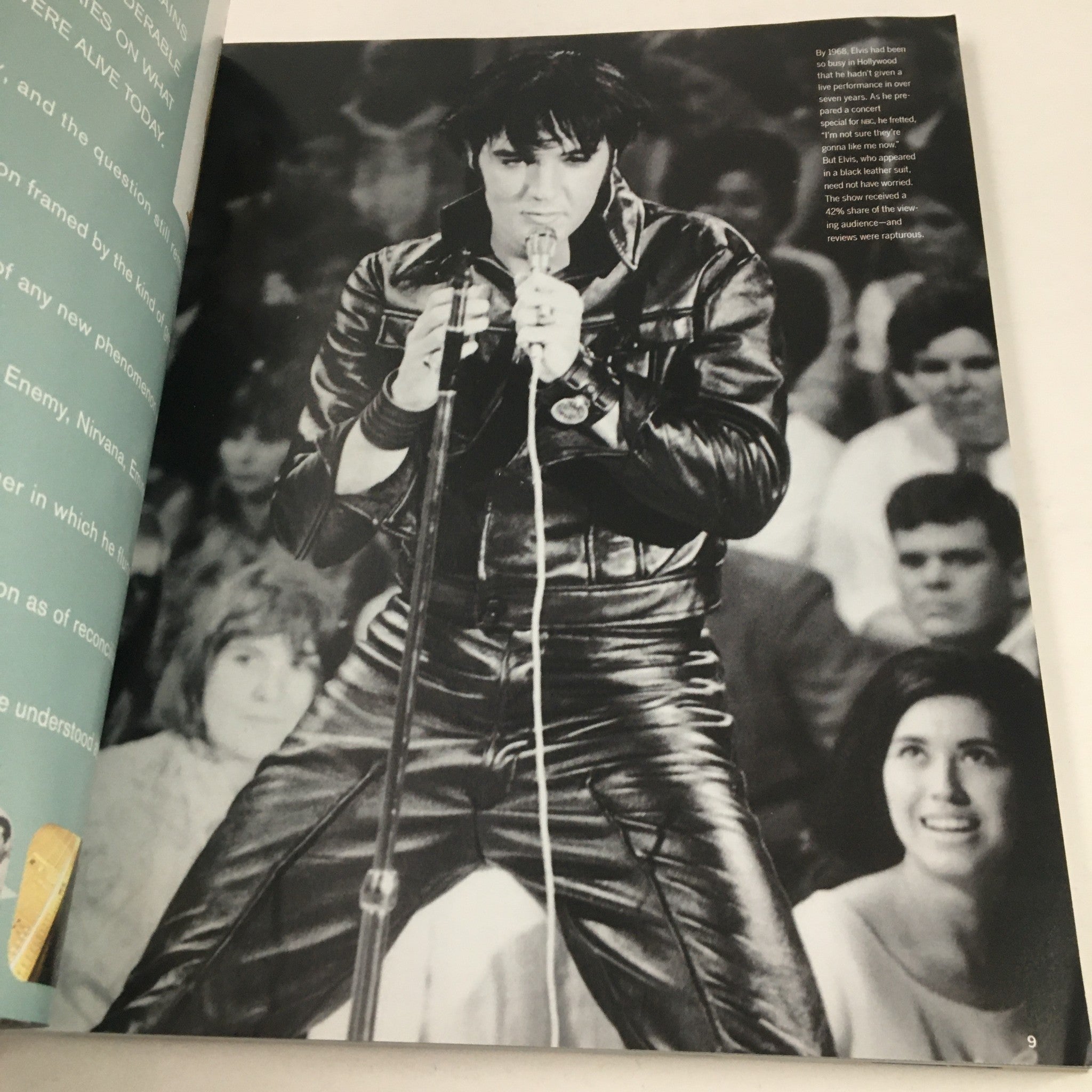 Inside page of Elvis Presley Then & Now Official Graceland 25th Anniversary Collector's Edition featuring Elvis performing live.