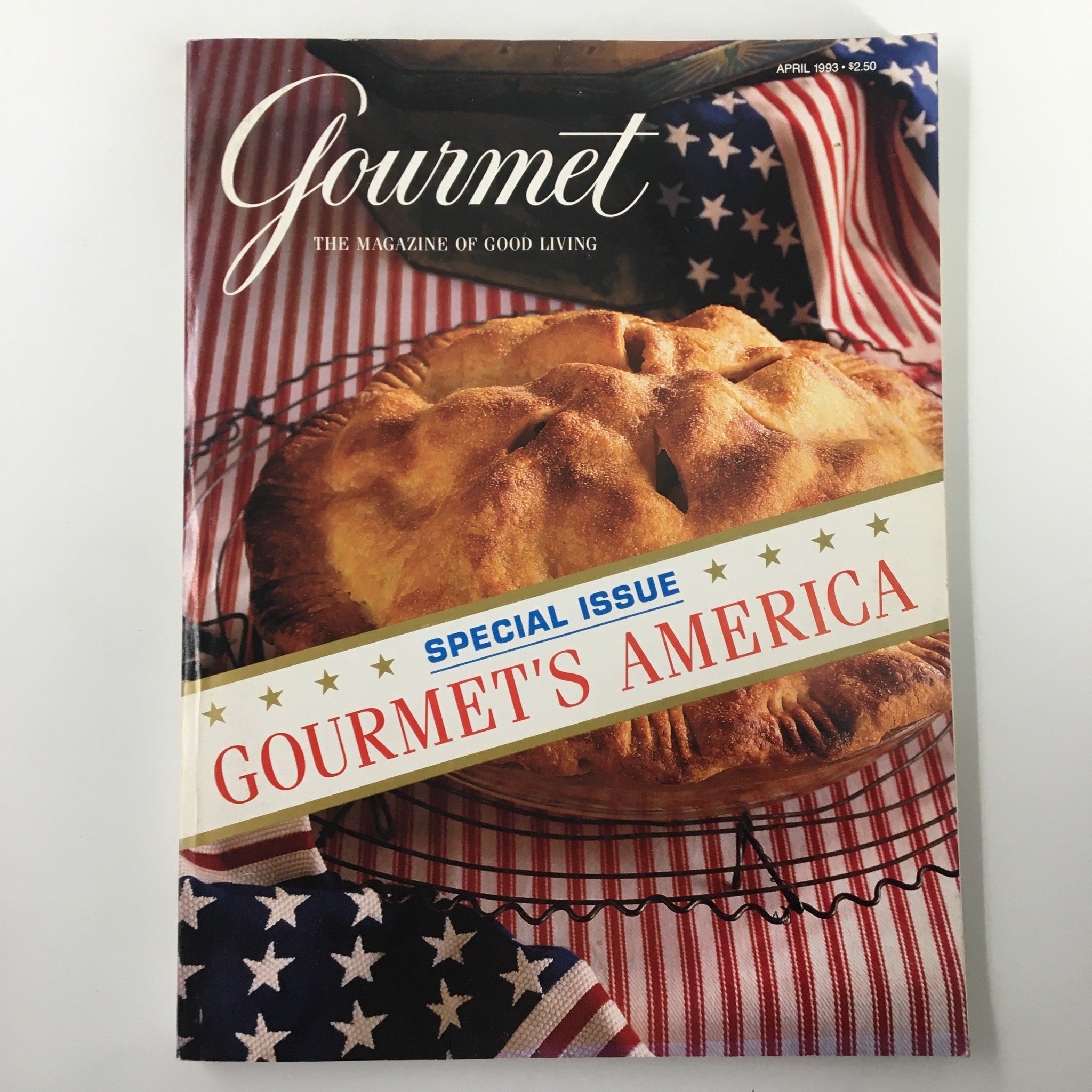Cover of Gourmet Magazine April 1993 featuring the theme 'It's Stars and Stripes and Apple Pie', showcasing a beautifully baked apple pie with a patriotic red and white striped background.