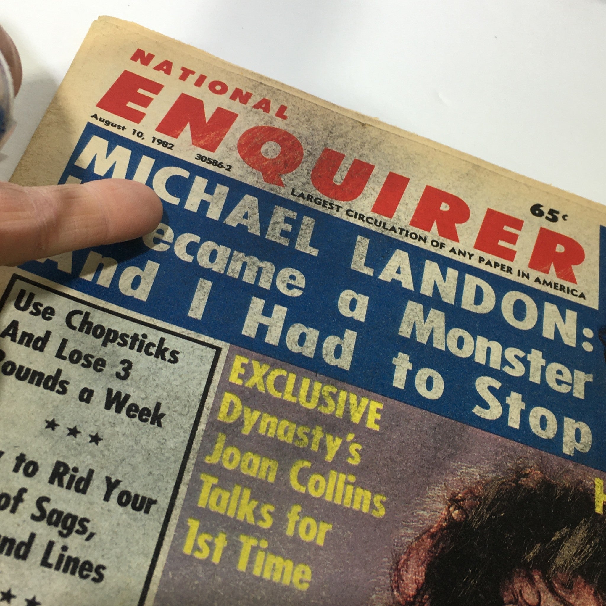Close-up of the cover of VTG National Enquirer Magazine dated August 10, 1982 focusing on the headline regarding Michael Landon and an exclusive feature about Joan Collins.