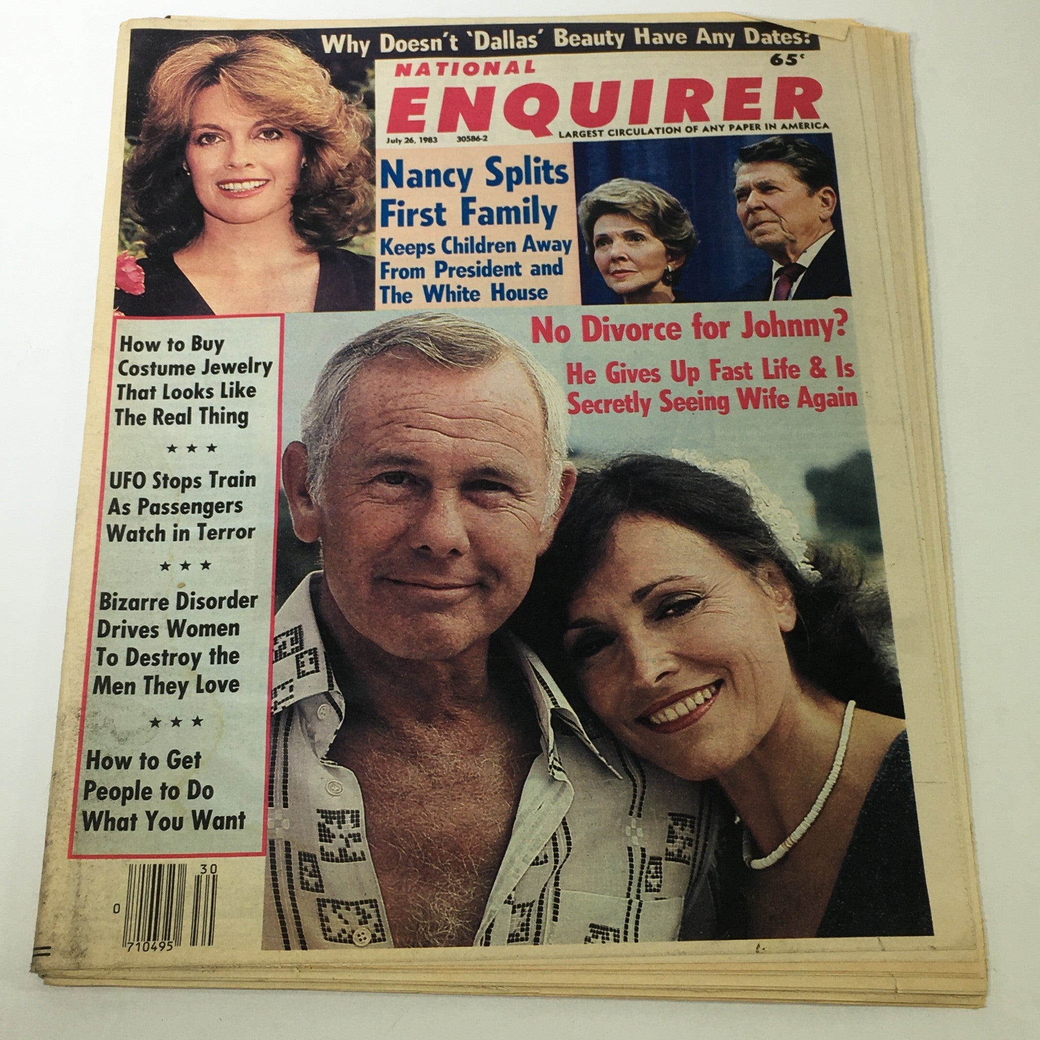 Cover of the National Enquirer Magazine from July 26, 1983, featuring Johnny Carson and Ronald Reagan, highlighting stories such as Nancy Reagan's family issues and personal insights into Carson's life, with notable vintage aesthetics.