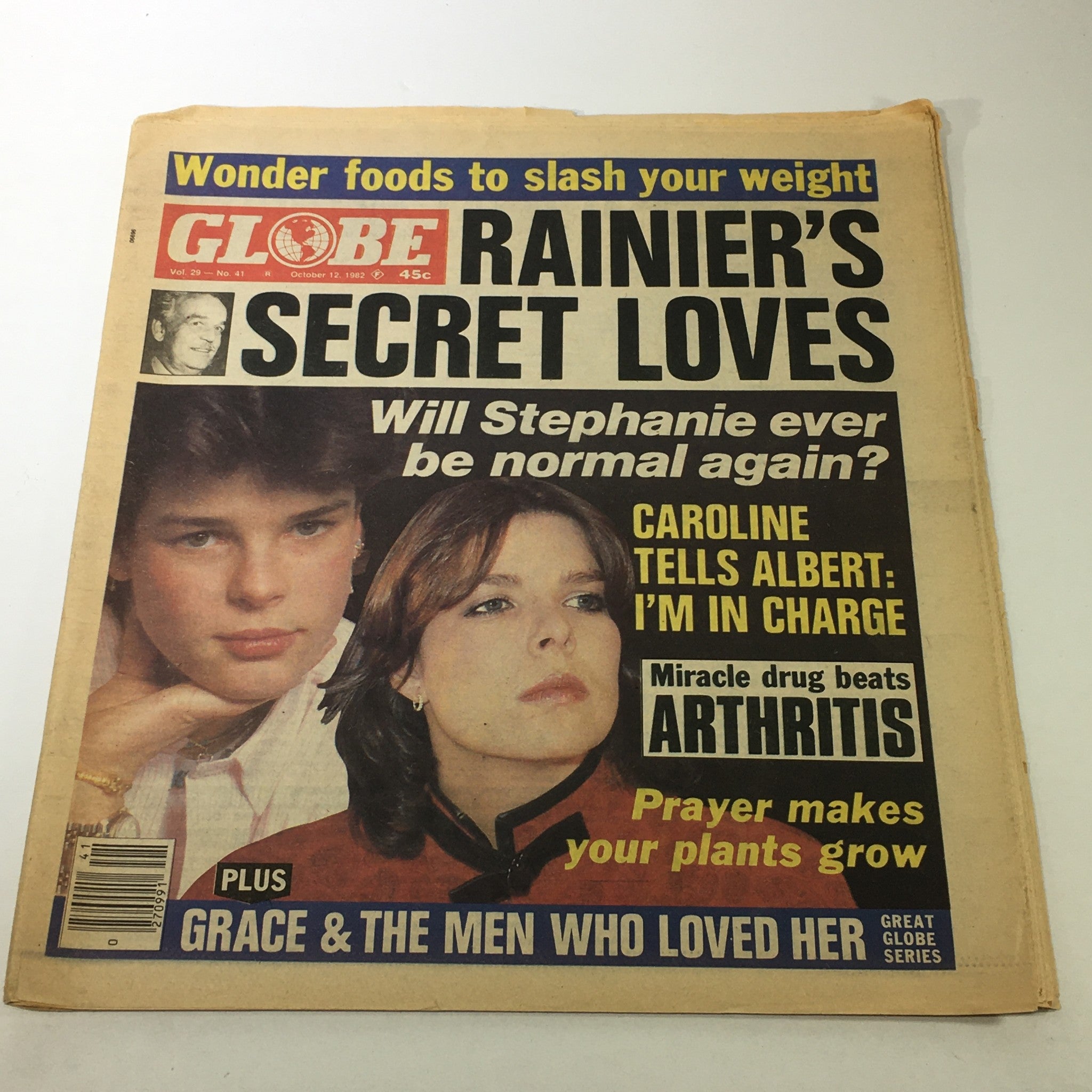 Cover of the VTG Globe Magazine, October 12, 1982, Volume 29, Issue 41 featuring bold headlines about Rainier's secret loves, Stephanie, and Caroline, reflecting cultural themes of the early 1980s.