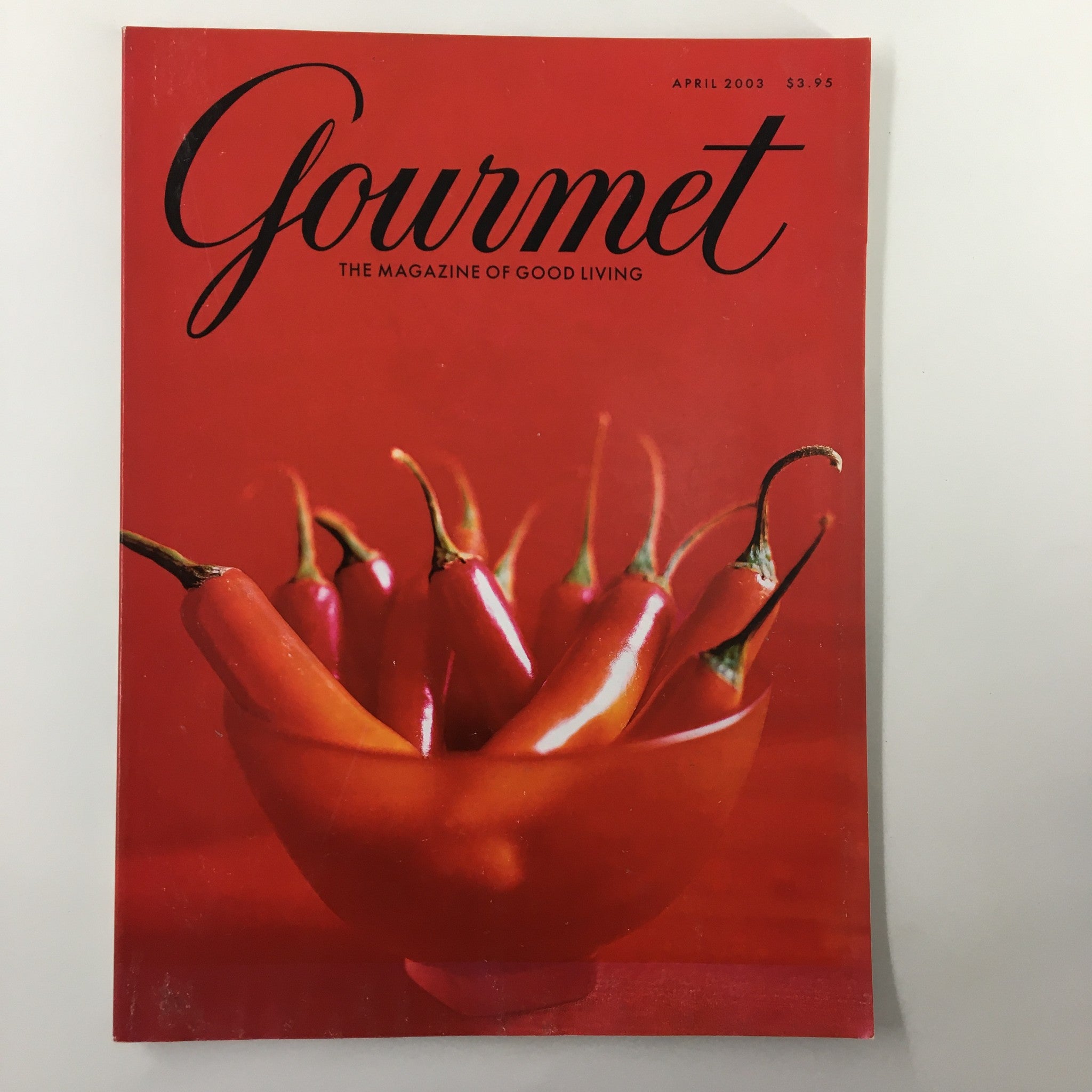 Gourmet Magazine April 2003 cover featuring vibrant red chillies in a bowl, exploring the current generation of Sichuanese cuisine.