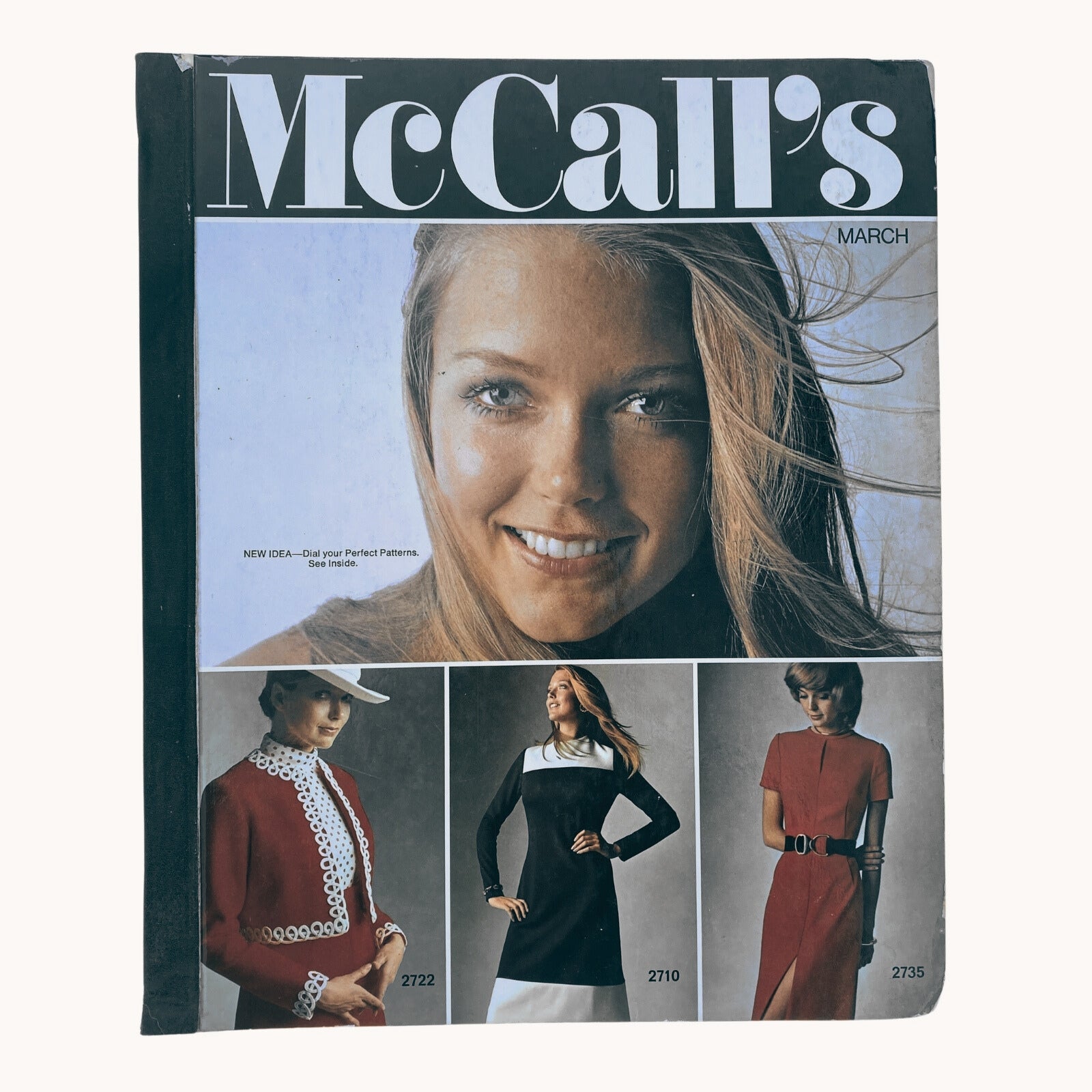 Cover of the 1971 March McCall's Catalog featuring a model smiling, showcasing seasonal fashion designs, including dresses and accessories. The cover highlights the vintage aesthetic of the early 1970s, ideal for sewing enthusiasts and collectors.
