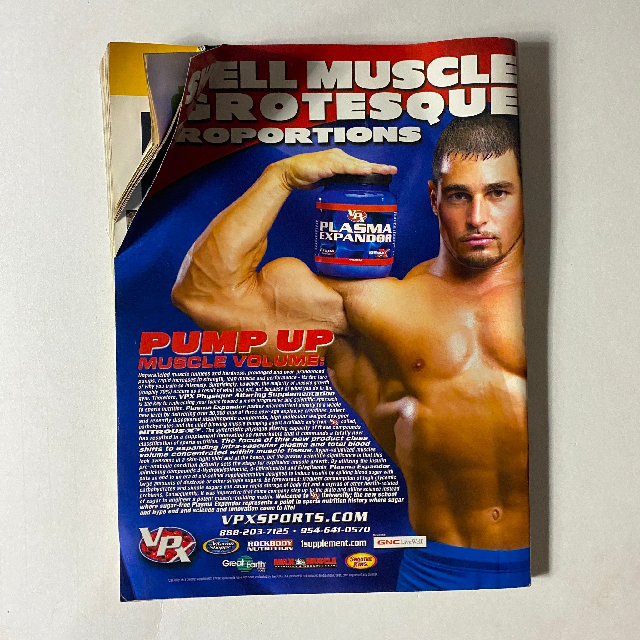 Advertisement page from Iron Man Magazine January 2003 promoting VPX sports supplement with a muscular model.