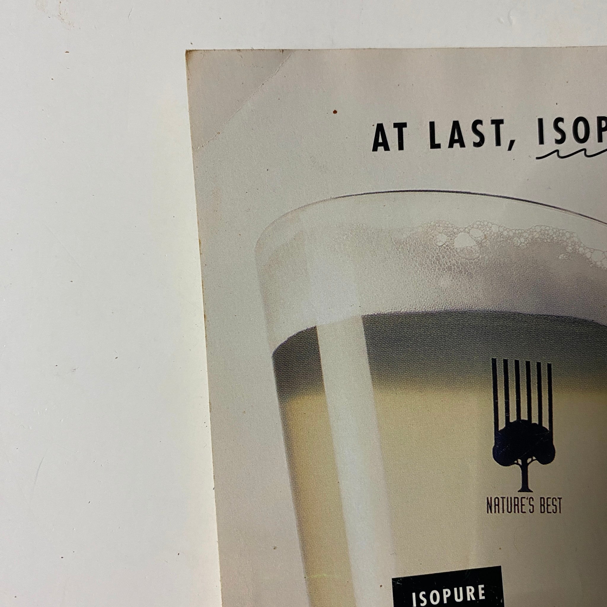 Cover page of Iron Man Magazine January 2000 featuring an advertisement for Isopure, showcasing a glass of protein shake. This collectible magazine highlights fitness icons Christian Boeving and Angelique Gorges, perfect for vintage bodybuilding enthusiasts.