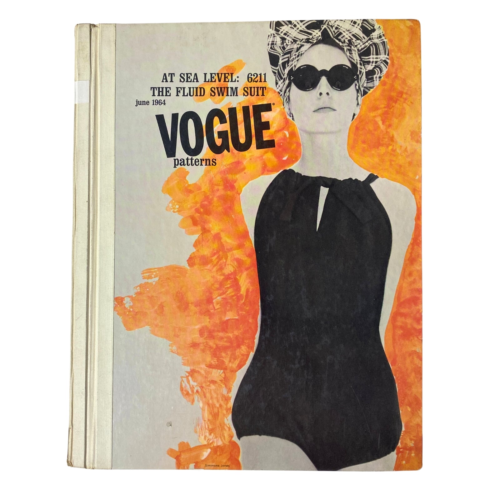 Cover of Vogue Patterns June 1964 Catalog featuring a model in a black swimsuit and sunglasses, showcasing mid-century fashion design.