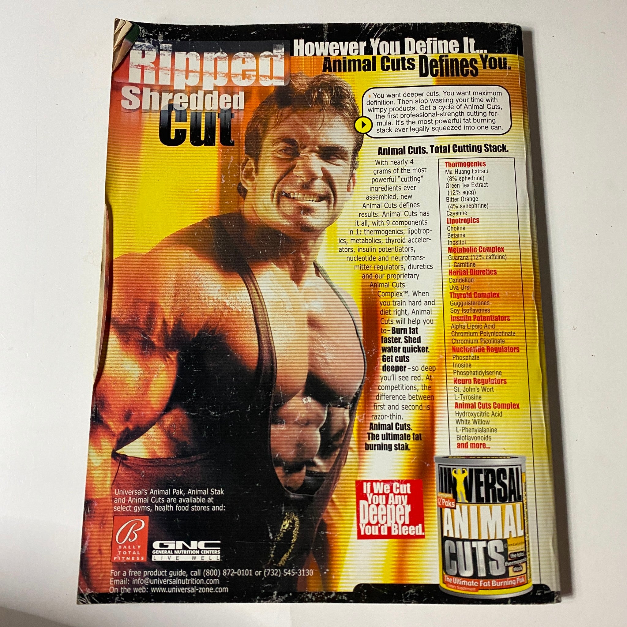 Back cover of Iron Man Magazine February 2001 featuring an advertisement for animal supplements, highlighting fitness imagery.