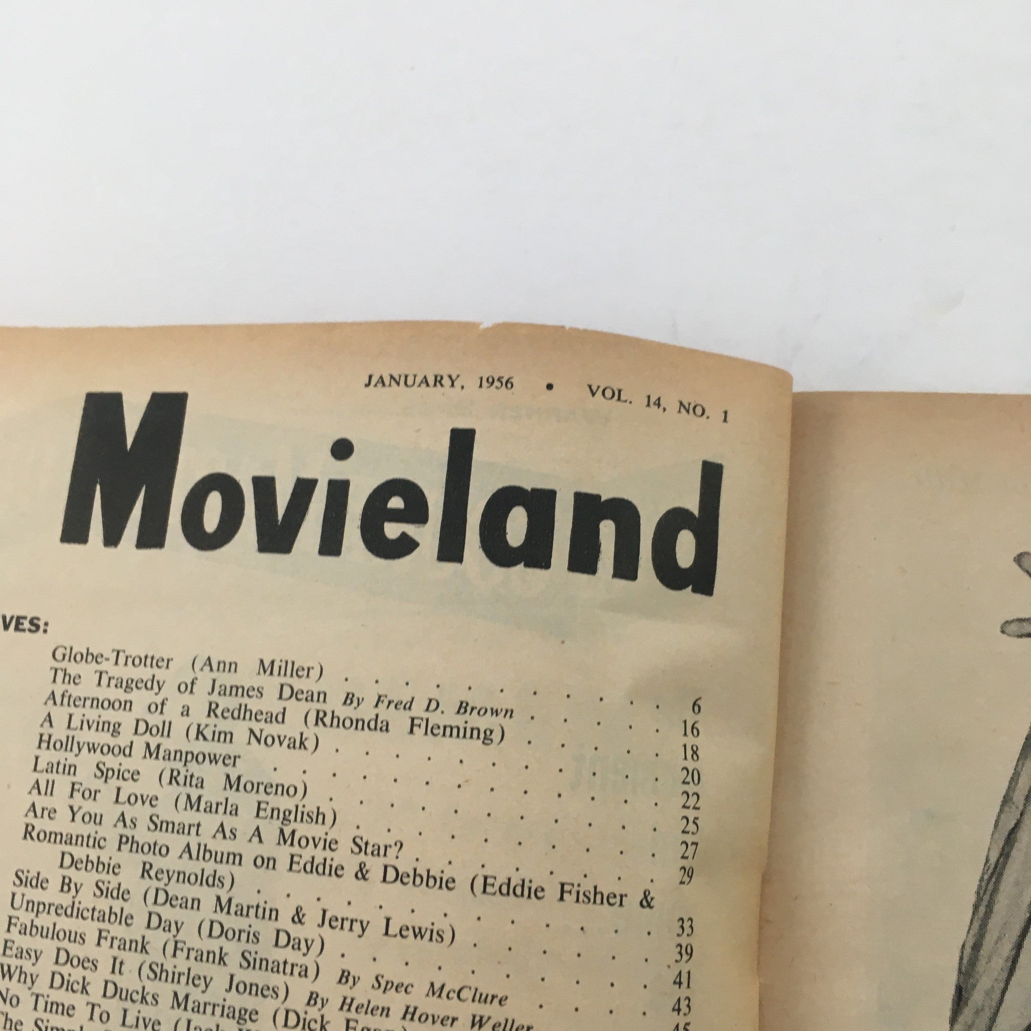 Close-up of the VTG Movieland January 1956 magazine cover page displaying the title and details about featured articles, including notable Hollywood personalities.