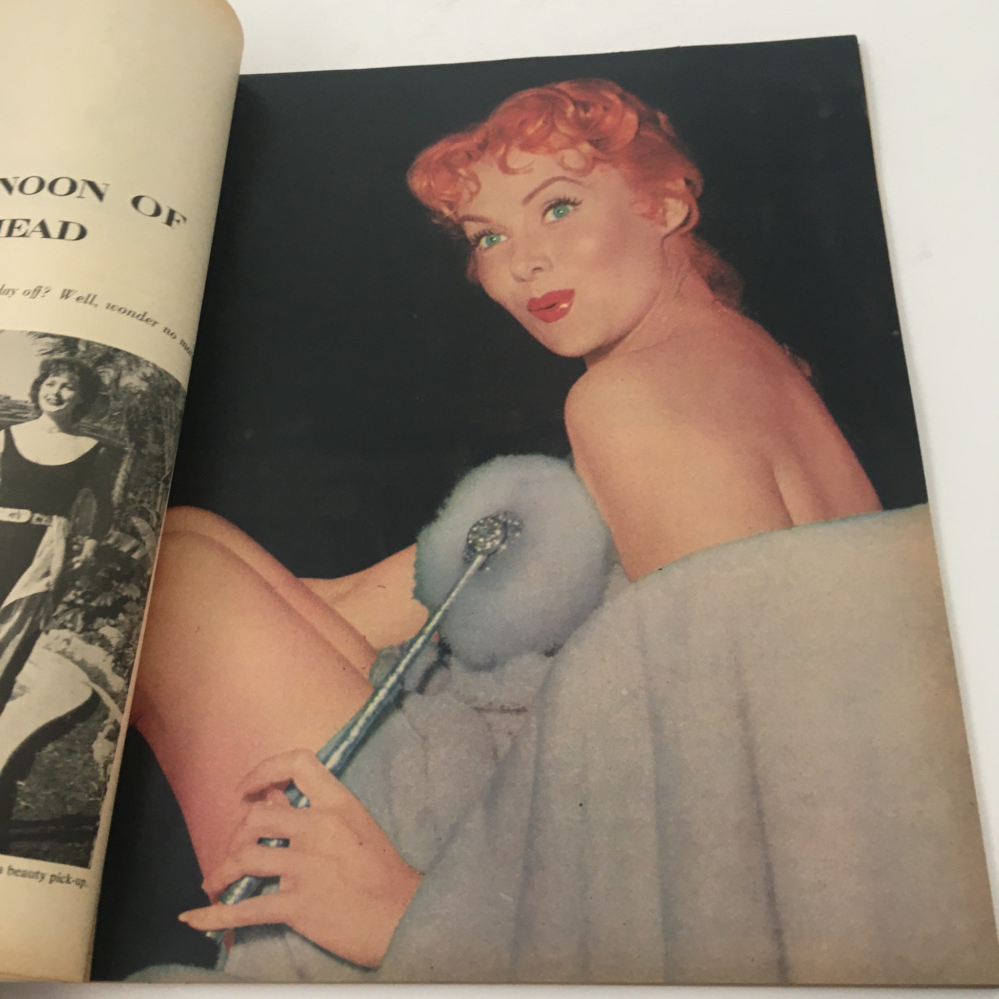 Colorful portrait page from VTG Movieland January 1956 magazine, featuring a glamorous model with styled red hair and elegant makeup, showcasing classic beauty trends.